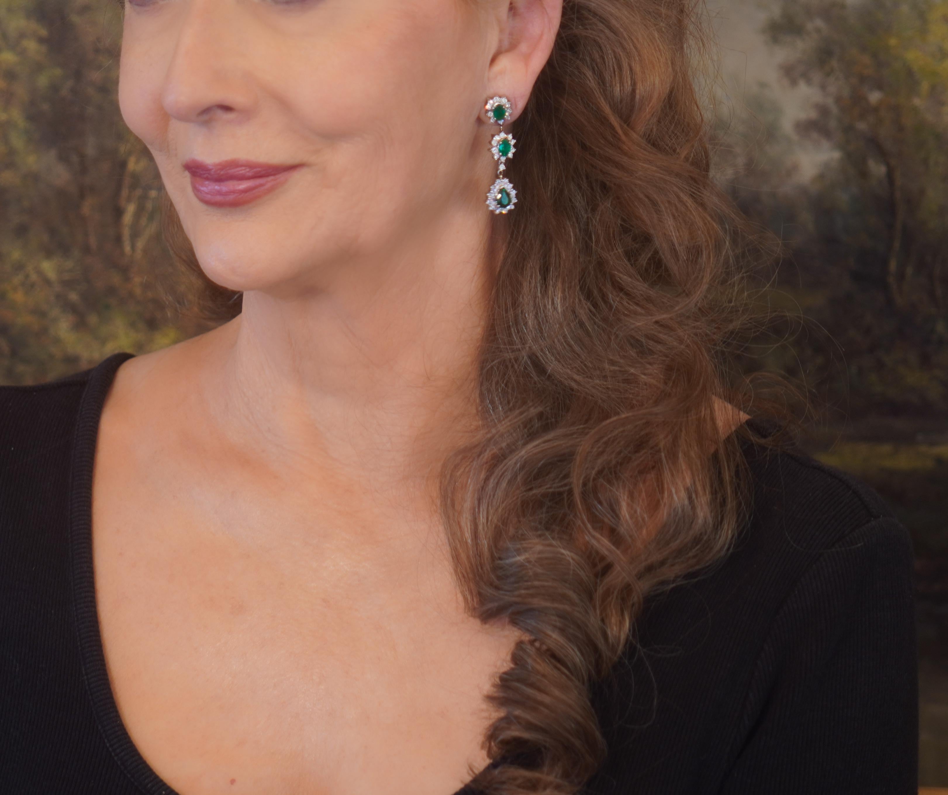 Old South Jewels proudly presents LUXURY.   VINTAGE GIA CERTIFIED 8.06 CARAT RARE EMERALDS & DIAMOND 14K EARRINGS & BOX!   VIVID GREEN TRANSPARENT EMERALDS ARE CROWNED WITH 3.02 CARATS OF SPARKLING DIAMONDS.  FINE LONG DANGLING EMERALD EARRING ARE