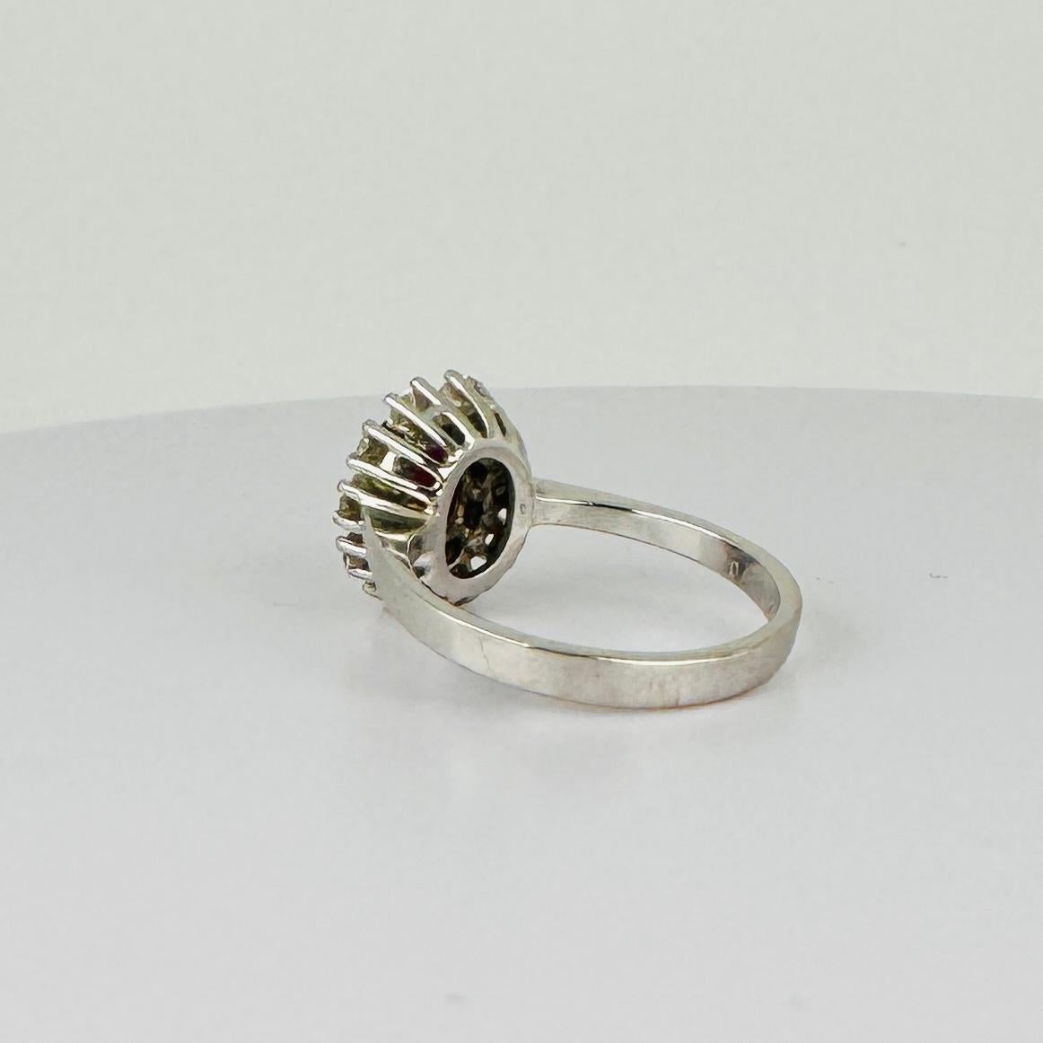 Women's 14k entourage white gold ring with oval ruby with 10 diamonds 0.50 carat VSI