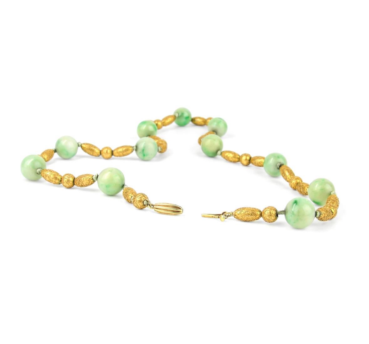 Measuring 15 7/8” long, this lovely Etruscan Revival necklace features apple green and white jade beads alternating with gold cannetille beads. Masterfully hand-fabricated in 14K yellow gold with a delightful bloomed finish.

 

Jade: 9.5