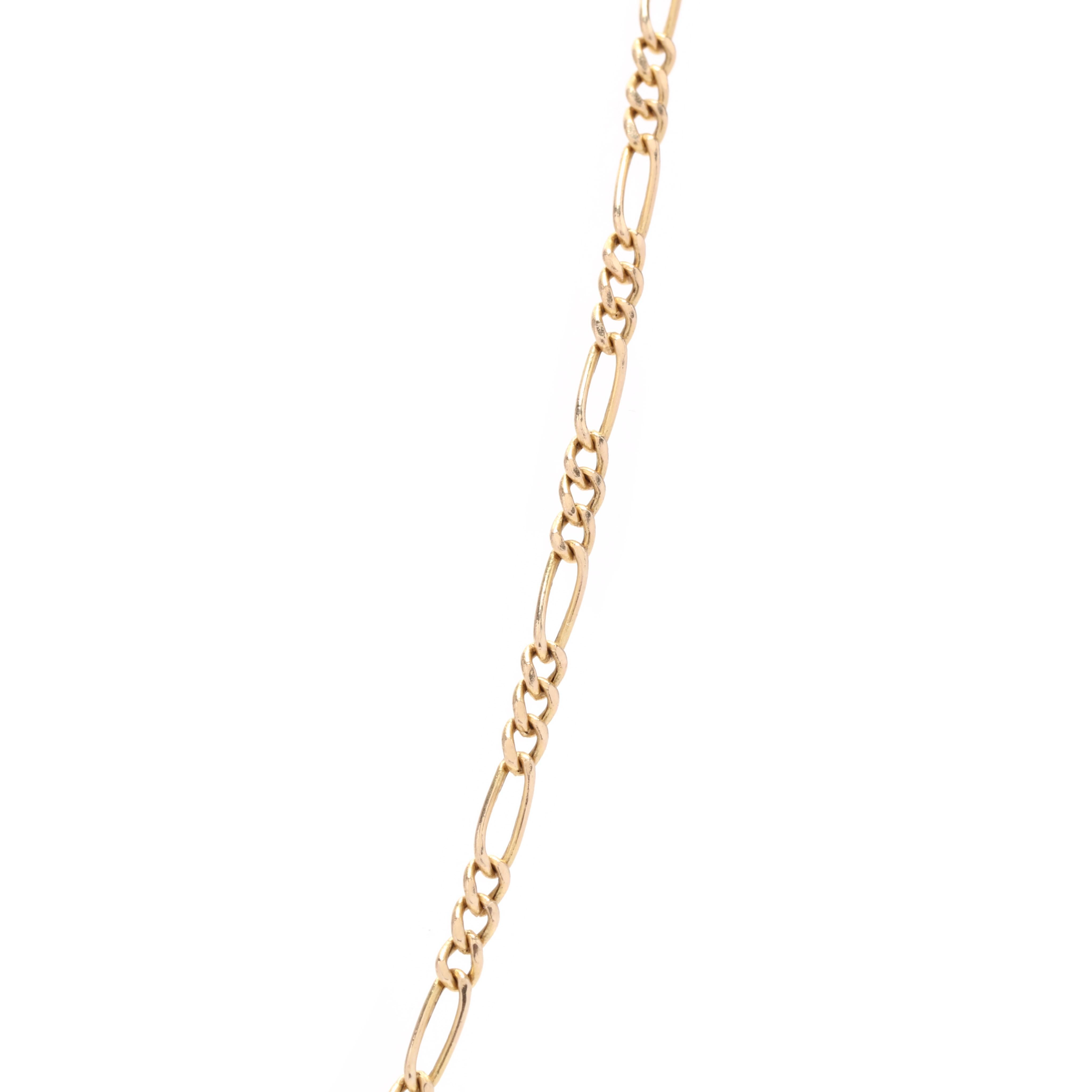 A vintage 14 karat yellow gold figaro chain. This thin chain features a short and elongated twisted curb link with a spring ring clasp.



Length: 18.5 in.



Width: 2.25 mm



Weight: 1.5 dwts.