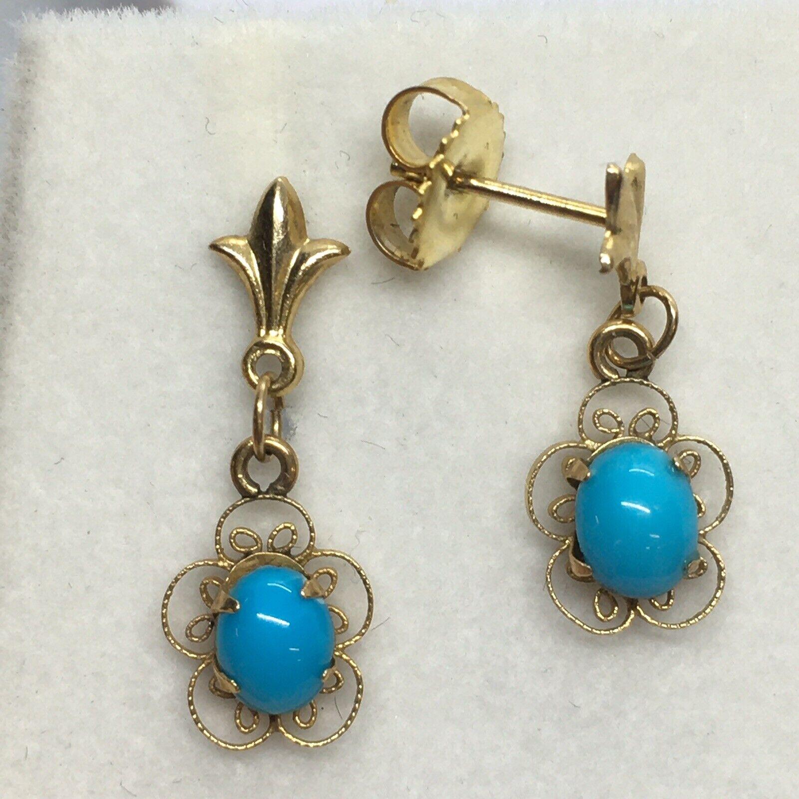 14k Filigree Gold Turquoise Retro 1940s  Drop Earrings Hand Made American


1.0 gram
3/4 inch hanging
6 mm by 5 mm natural Turquoise
No damage, no evidence of any repairs, see pictures 