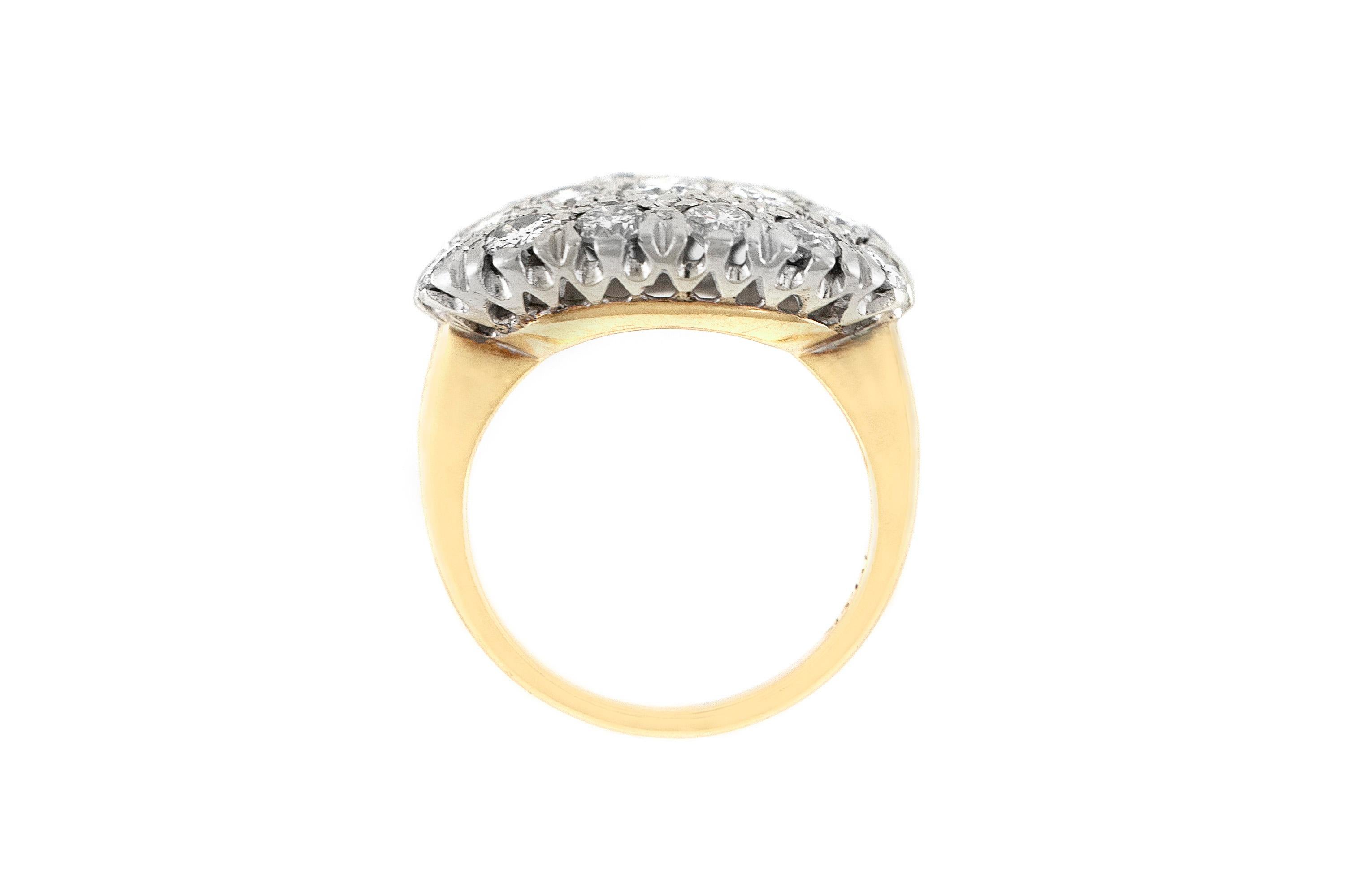 The ring is finely crafted in 14k yellow gold with diamonds weighing approximately tota of 1.10 carat.