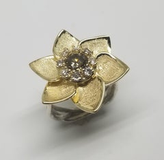 14 Karat Flower with Greenish Yellow .68pts. Diamond and .30pts. Halo