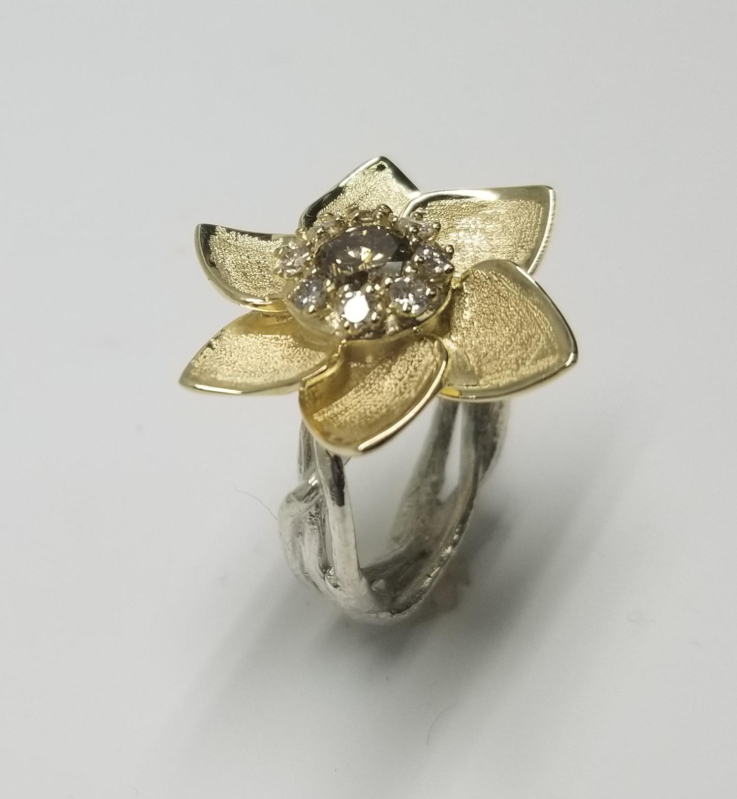 Artist 14 Karat Flower with Greenish Yellow .68pts. Diamond and .30pts. Halo For Sale