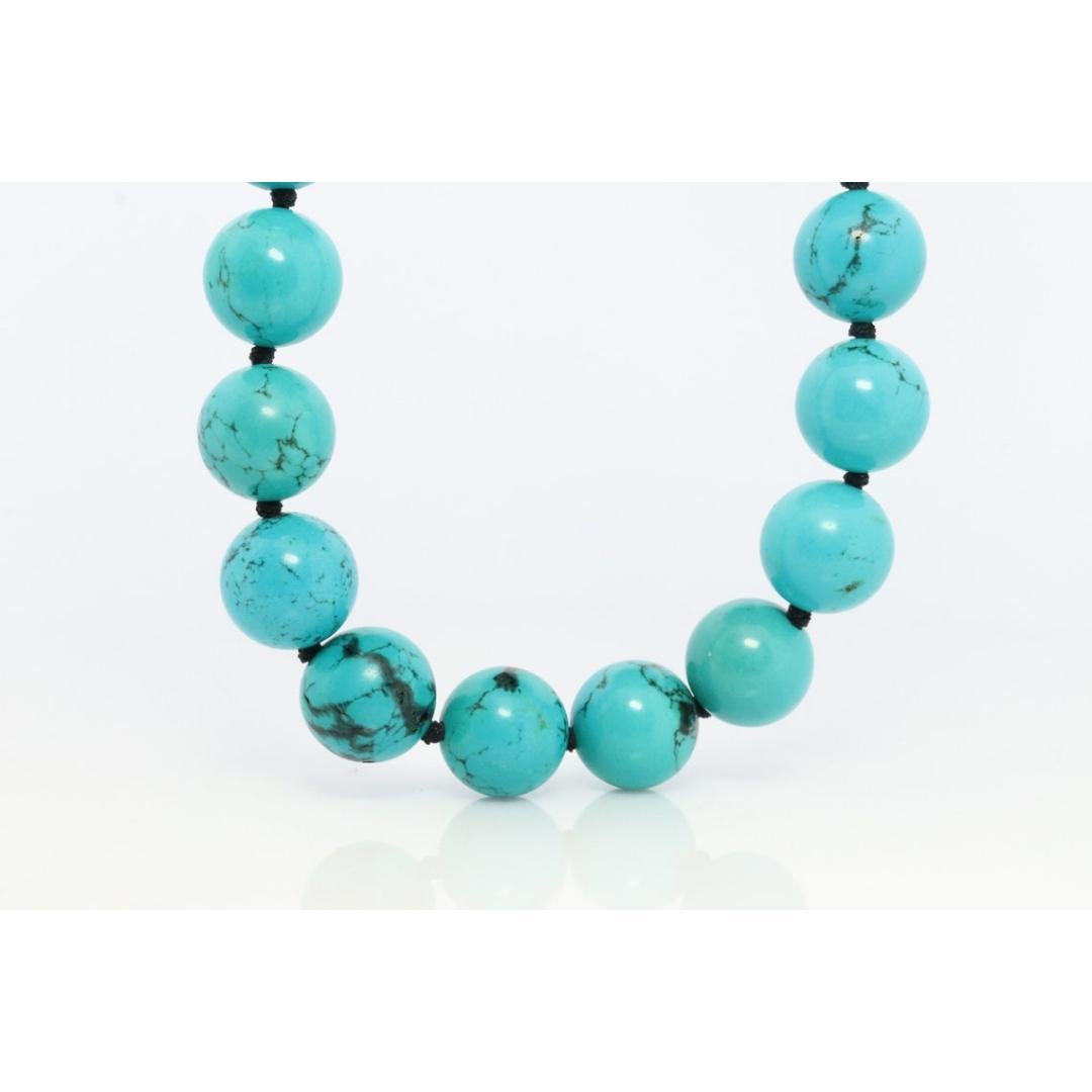 Vintage from the 1920s
Materials: Gemstone, Silver
Gemstone: Turquoise
Closure: Hook
Chain style: Bead

Style: Mid-century

Wonderful set of Genuine Natural round Turquoise.

Each round bead is knotted.

Condition:
Shows little to no signs of