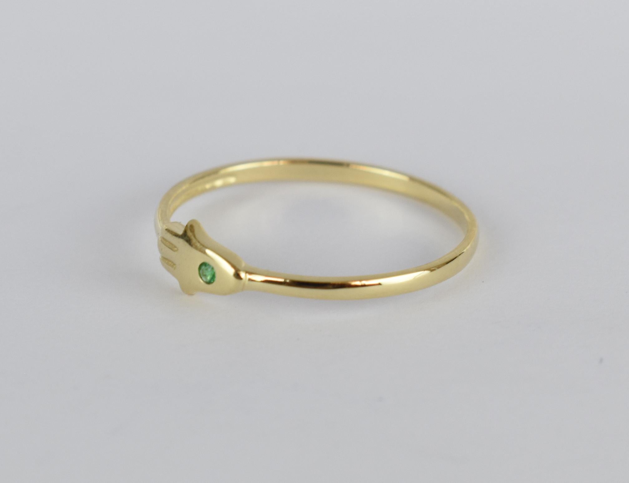 For Sale:  14k Gold 0.02 Carat Emerald Hamsa Hand Ring  6