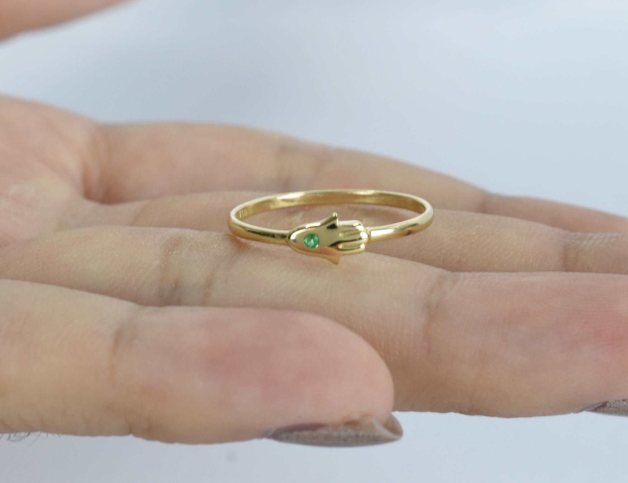 For Sale:  14k Gold 0.02 Carat Emerald Hamsa Hand Ring  9