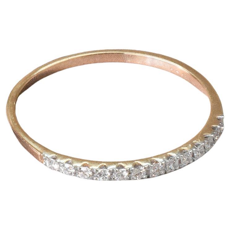 Anillo de media eternidad de oro de 14 quilates y 0,11 quilates de diamantes