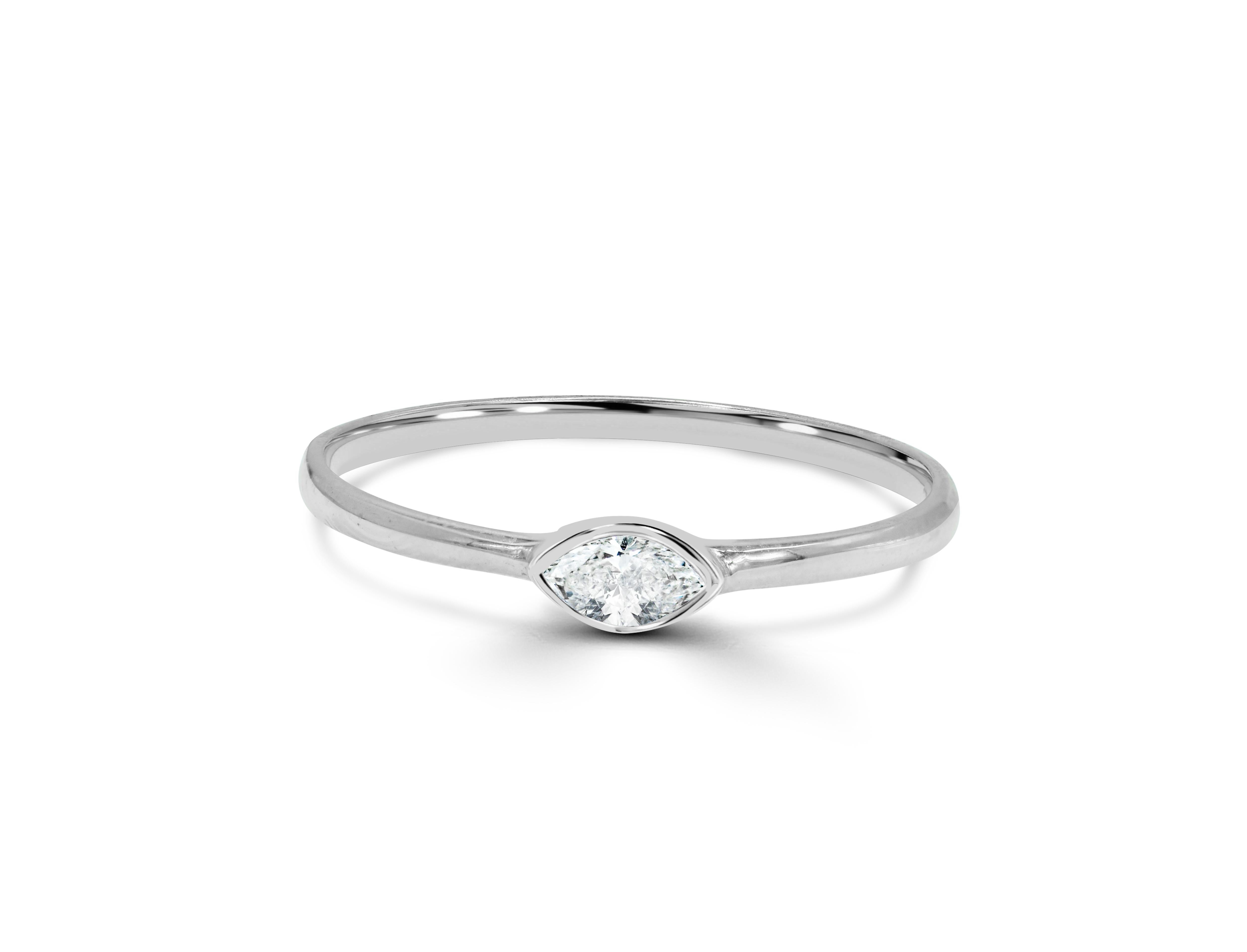 For Sale:  14k Gold 0.15 Carat Solitaire Marquise Diamond Minimalist Ring 4
