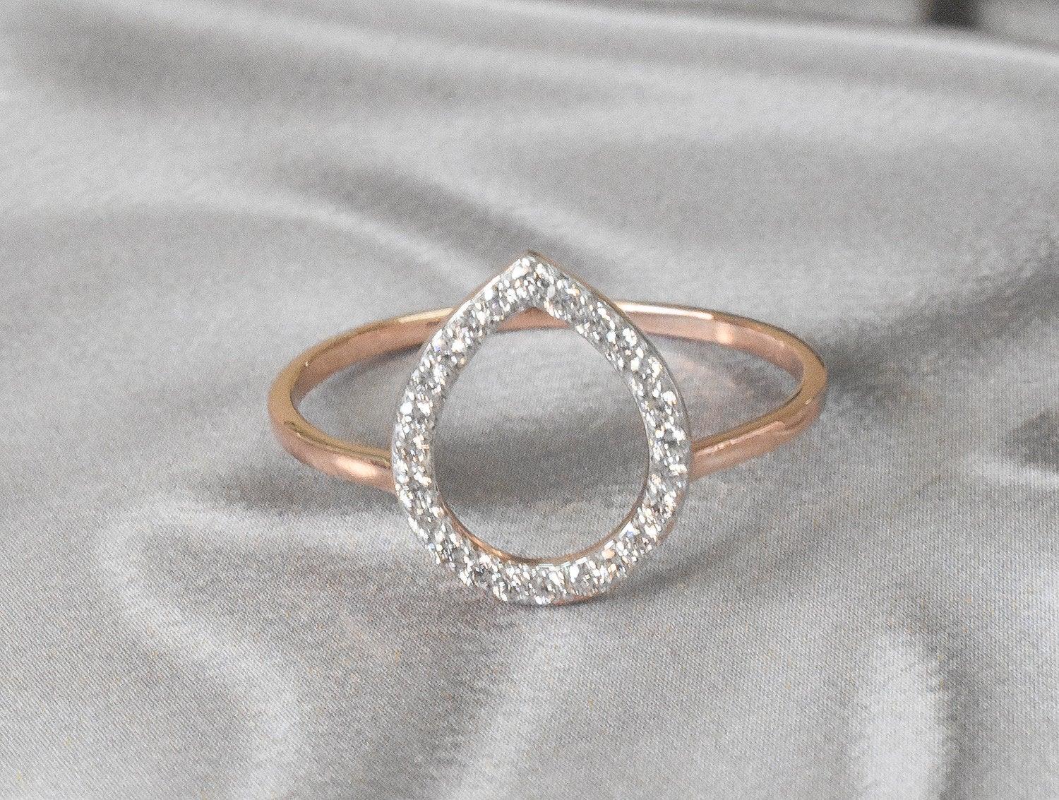 For Sale:  14k Gold 0.18 Carat Diamond Pear shape open Ring 4