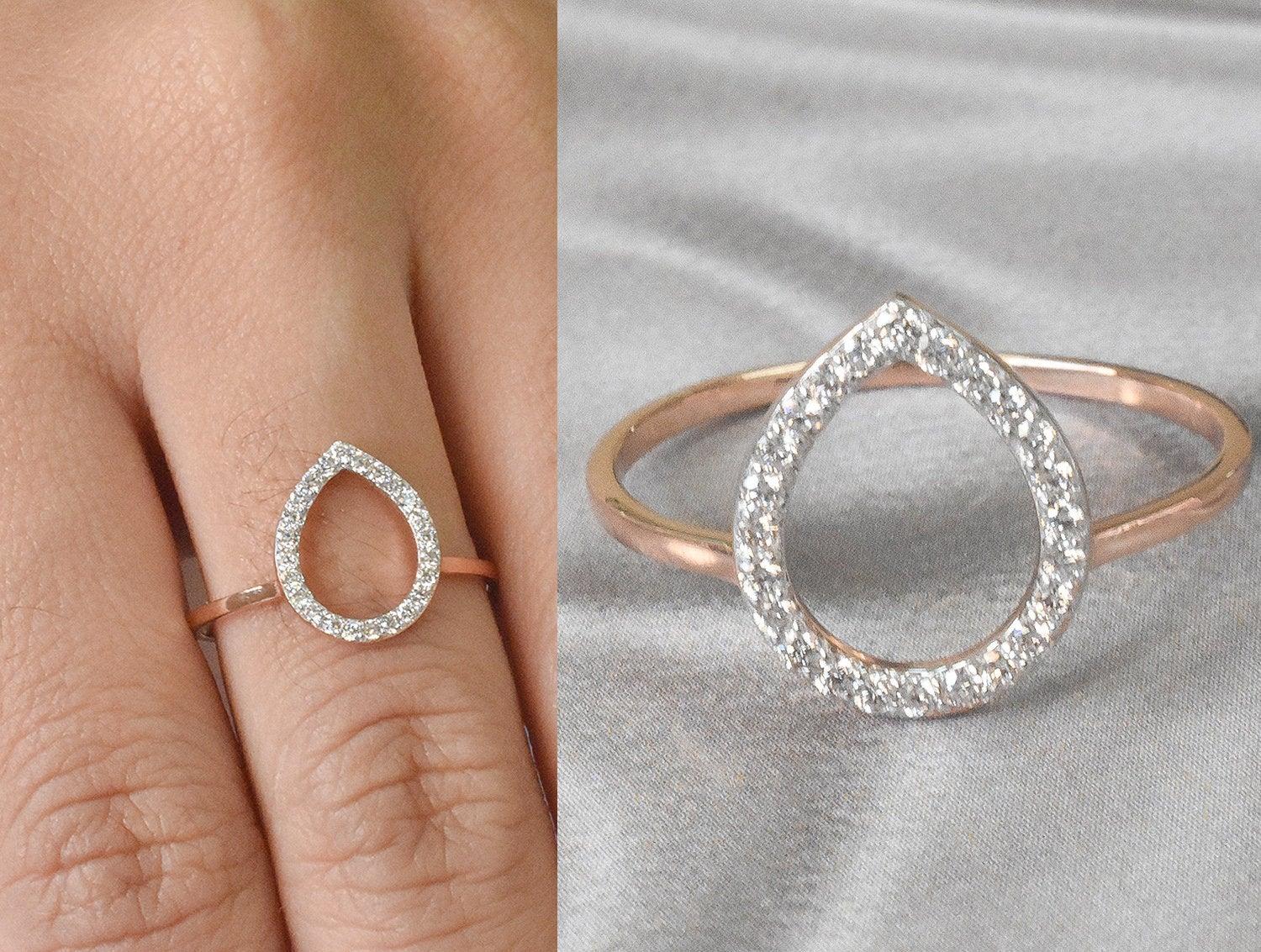 For Sale:  14k Gold 0.18 Carat Diamond Pear shape open Ring 6