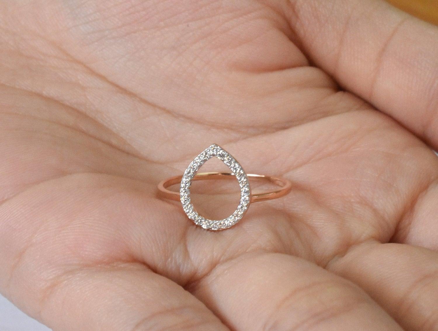 For Sale:  14k Gold 0.18 Carat Diamond Pear shape open Ring 7
