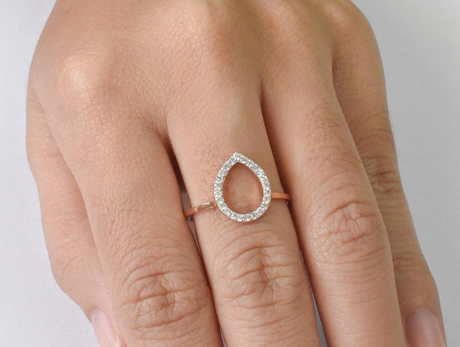 For Sale:  14k Gold 0.18 Carat Diamond Pear shape open Ring 8