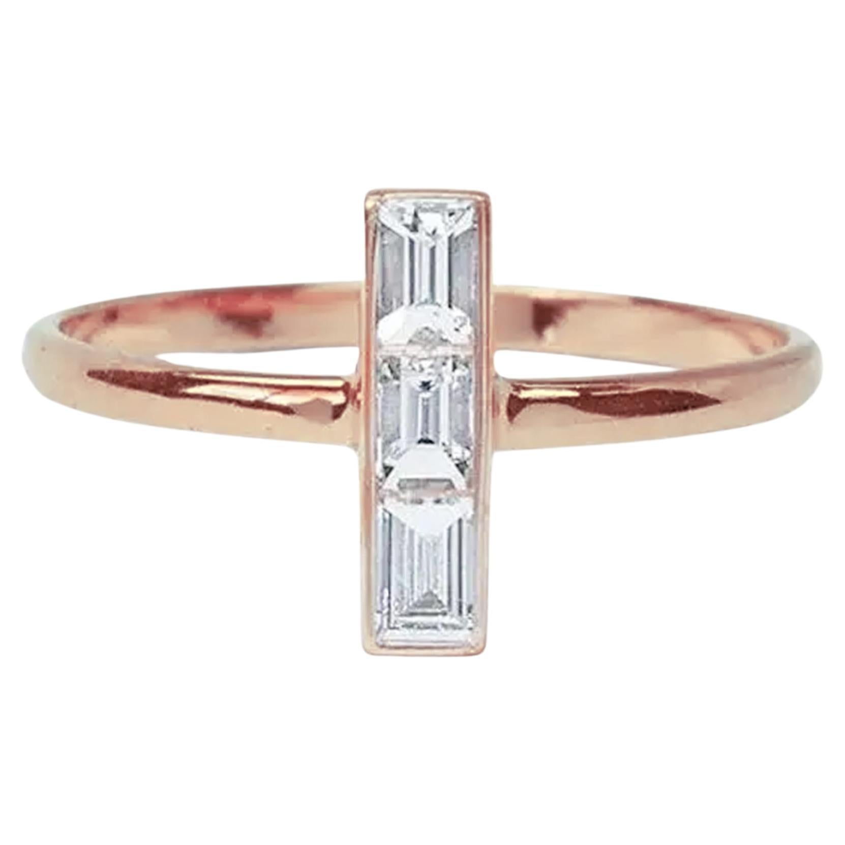 For Sale:  14k gold 0.30 Carat baguette diamond vertical bar ring