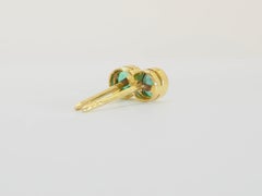 Boucles d'oreilles en or 14K avec chaton de 0.40ct d'émeraudes rondes et vives