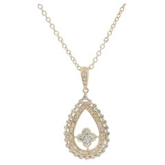 Ciondolo a goccia in oro 14k con diamanti dettagliati da 0,66 ct.