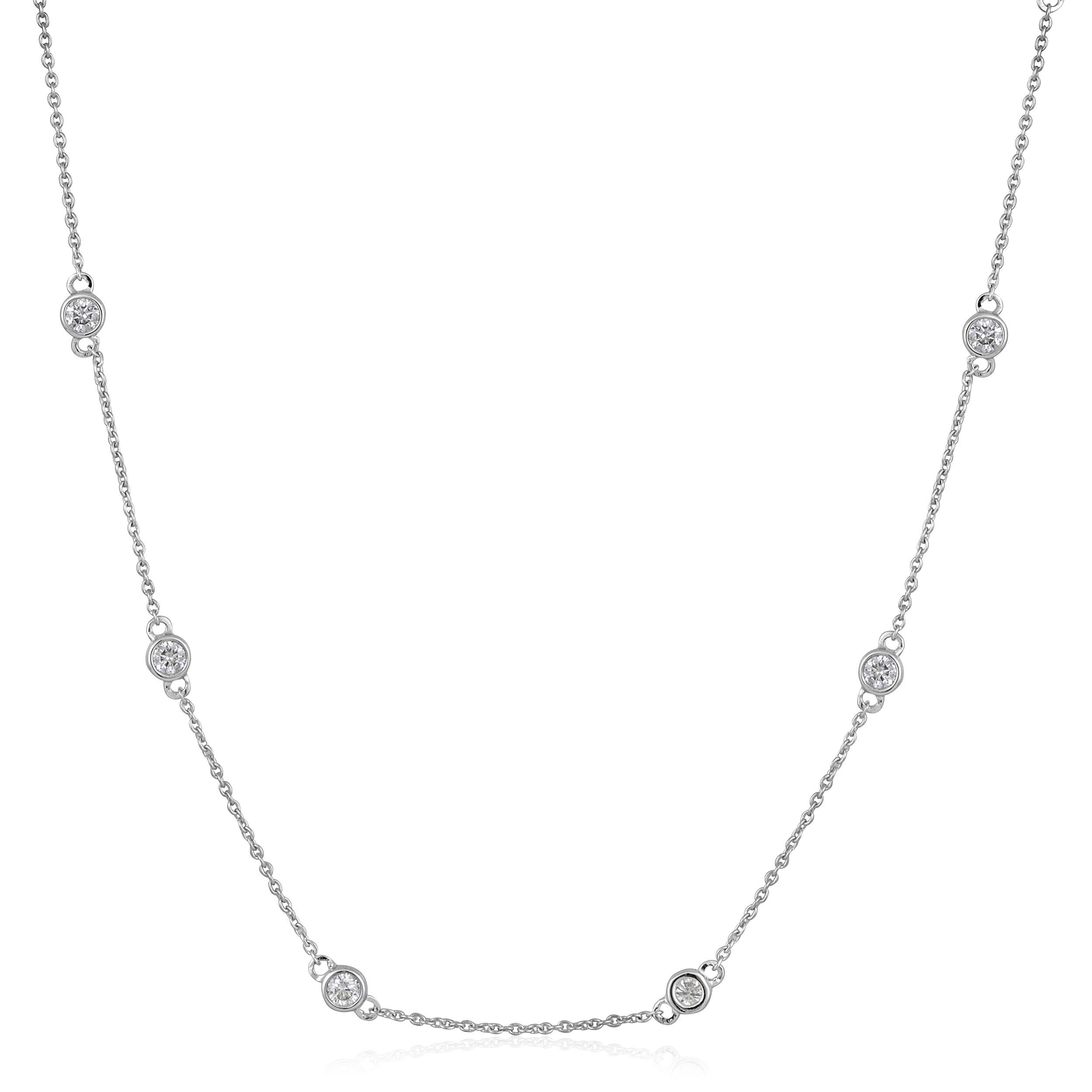 Crafted in 2.89 grams of 14K White Gold, the necklace contains 14 stones of Round Natural Diamonds with a total of 0.79 carat in F-G color and SI clarity. The necklace length is 18 inches.

CONTEMPORARY AND TIMELESS ESSENCE: Crafted in