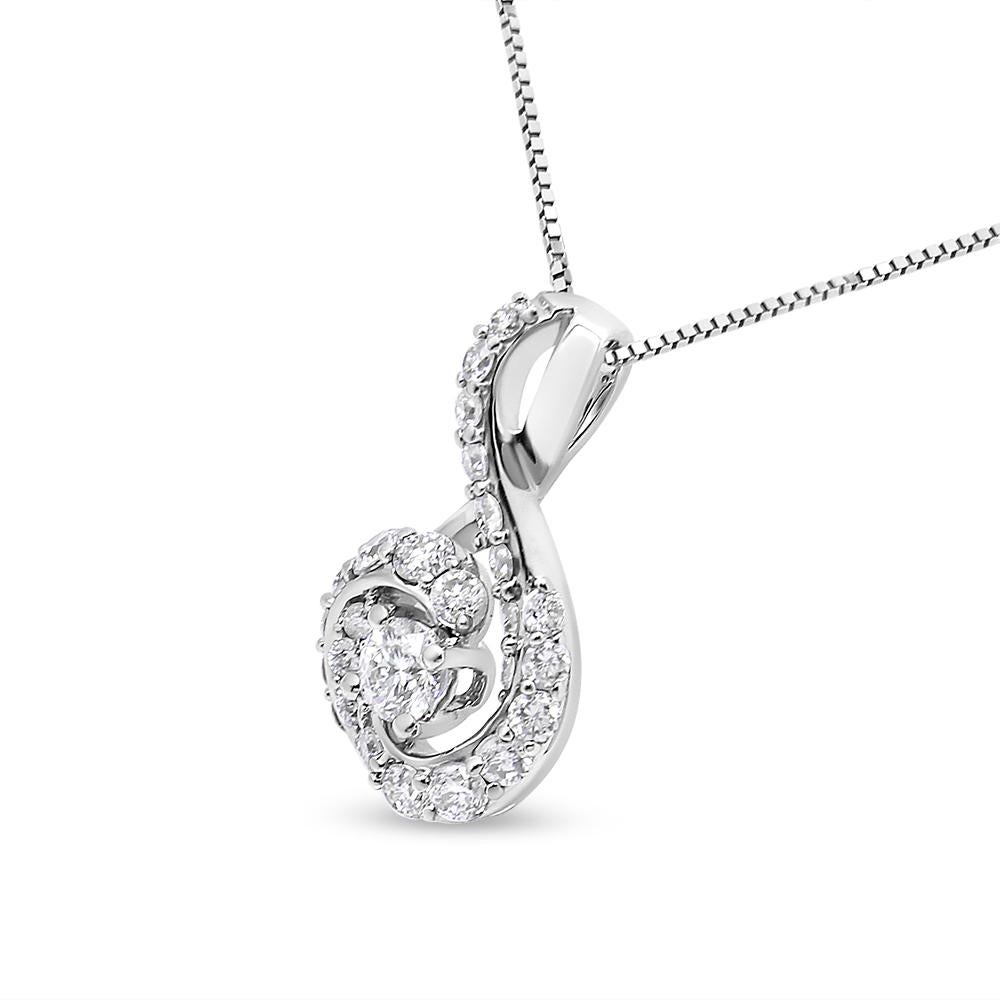 This gorgeous 14K white gold pendant features an 