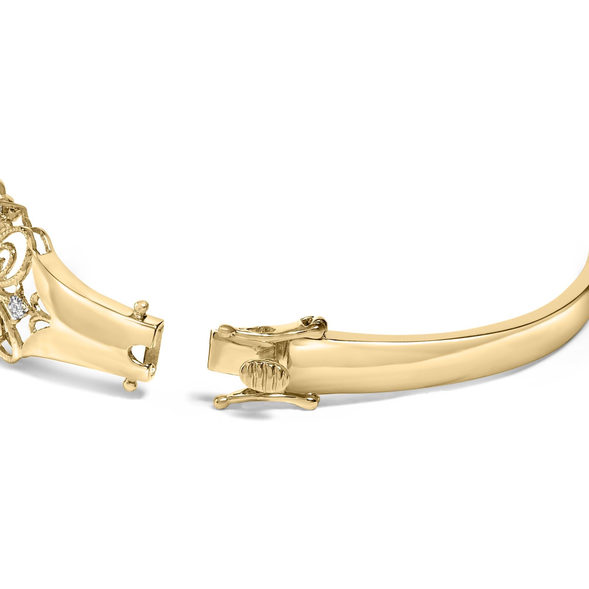 Embrace timeless elegance with this 14K gold bangle, exquisitely adorned with radiant natural diamonds totaling 1.00 carat, featuring H-I color and SI1-SI2 clarity, which shimmer enchantingly amidst a vintage-inspired floral motif. The intricate