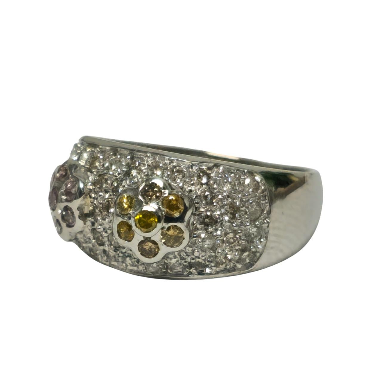 Crafted from luxurious 14K white gold, this exclusive ring boasts a total carat weight of 1.10 carats, showcasing a stunning combination of white, pink, and yellow diamonds. The white diamonds feature SI clarity and G color, radiating brilliance and