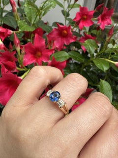 14k Gold 1.49ctw Royal Blue Sapphire w/ Baguette Diamond Sides Bow Style Ring