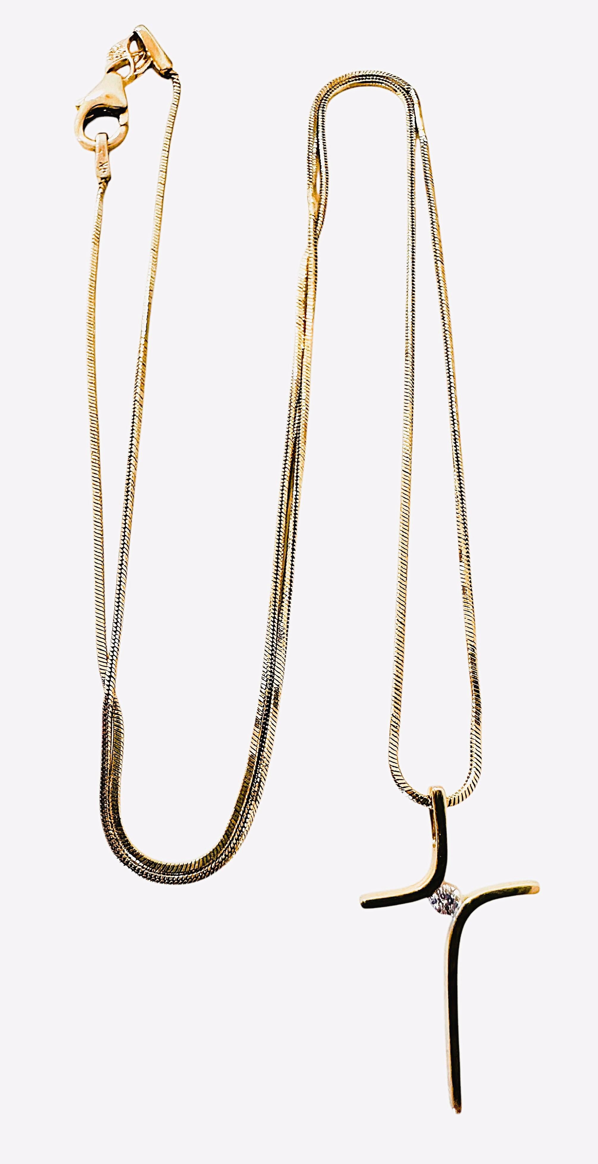 This is a very pretty necklace.  It's dainty and delicate.  One you can wear for any occasion or every day.  It is pre-owned but just like new.  It's been very well-cared for.  The pendant itself is .75 inches long and .50 inches wide.  It has a 1.5