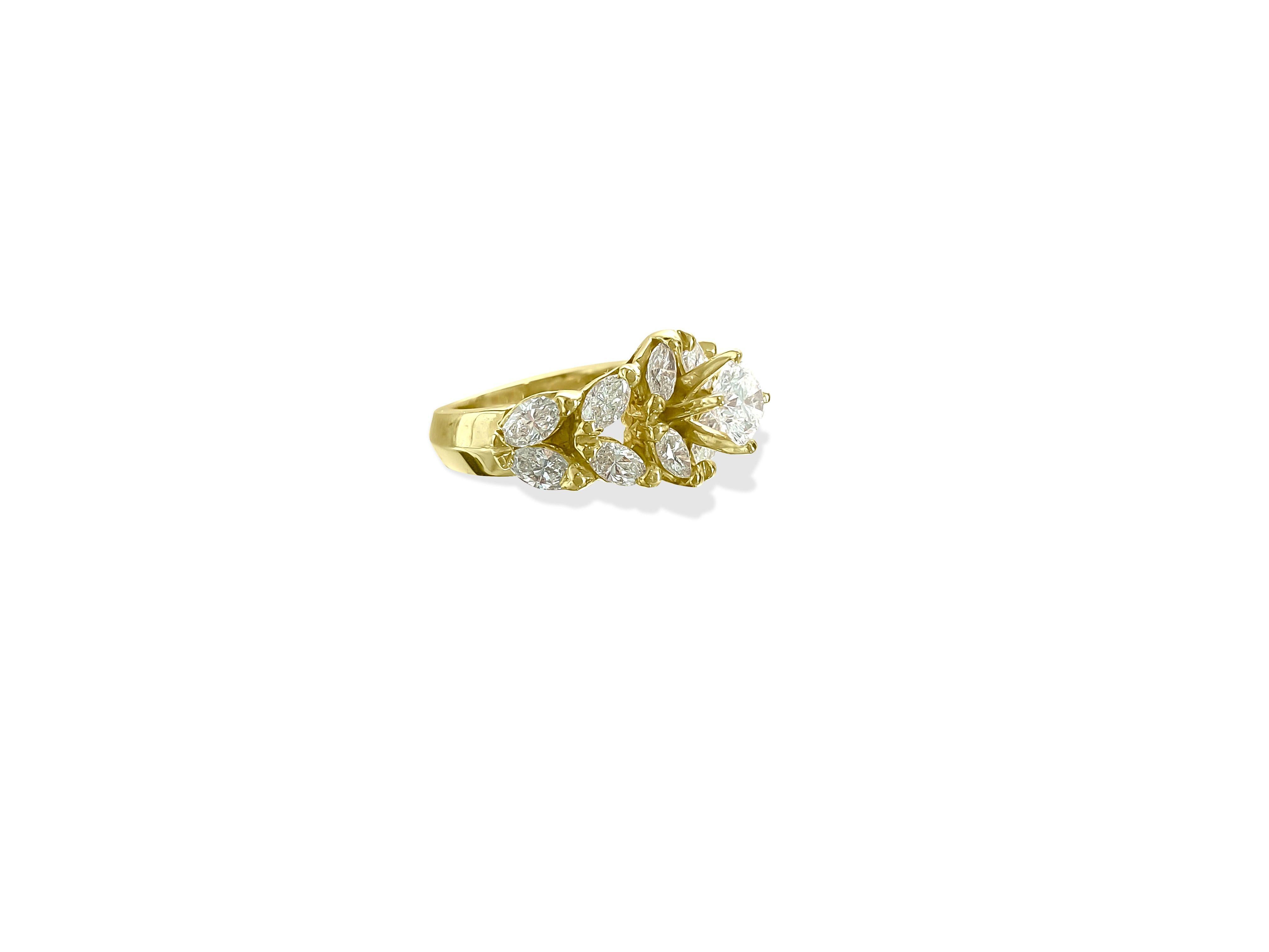 Forged from opulent 14K yellow gold, this magnificent ring features a captivating 0.75 carat round brilliant-cut center diamond, accompanied by 1.10 carats of marquise-cut side diamonds, totaling 1.85 carats. Exhibiting a G color and Si clarity,