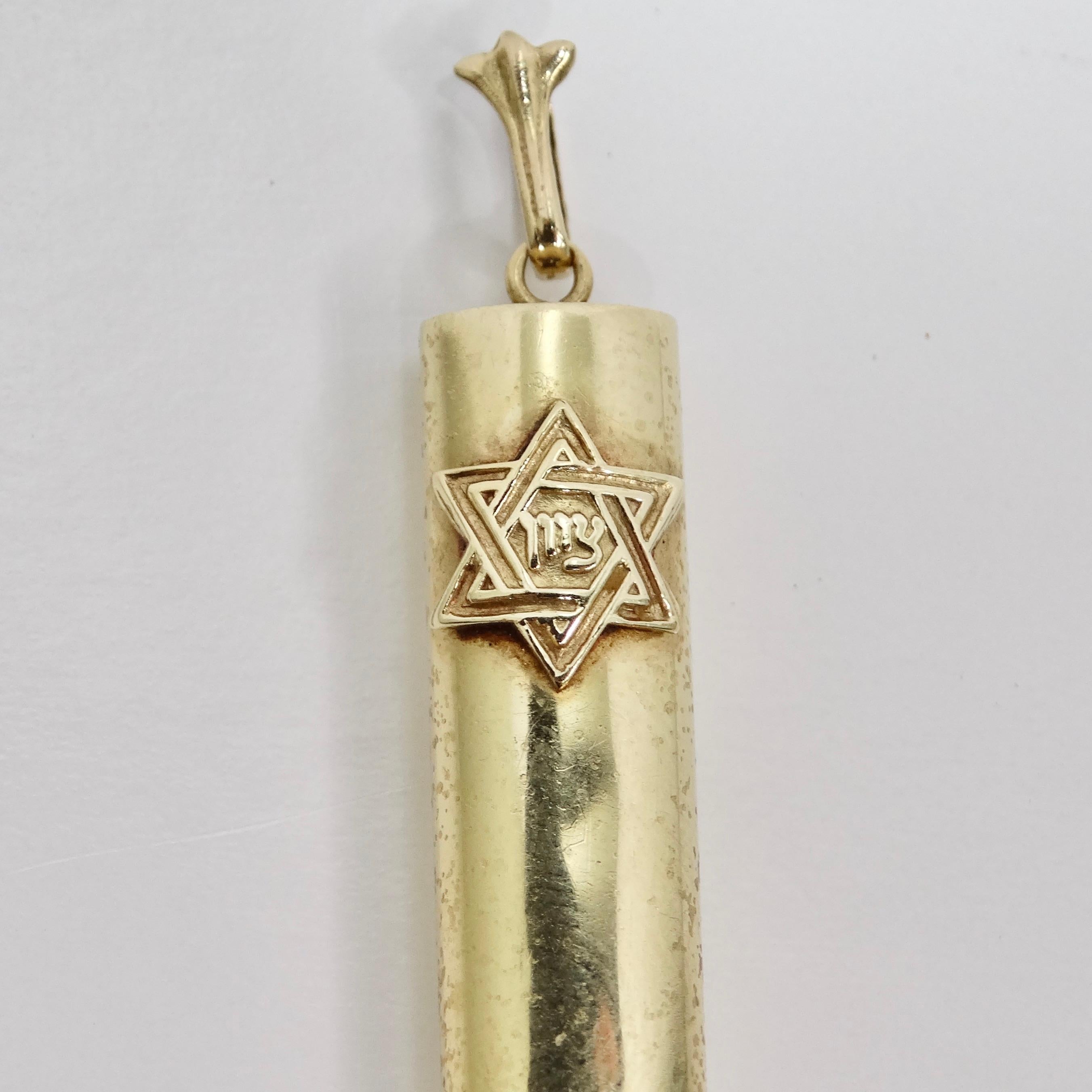Experience the timeless beauty of this 14K Gold 1960s Star of David Pendant, a meaningful piece that captures tradition and elegance. Crafted from 14k yellow gold, this rectangular pendant is a beautiful expression of faith and heritage.

The