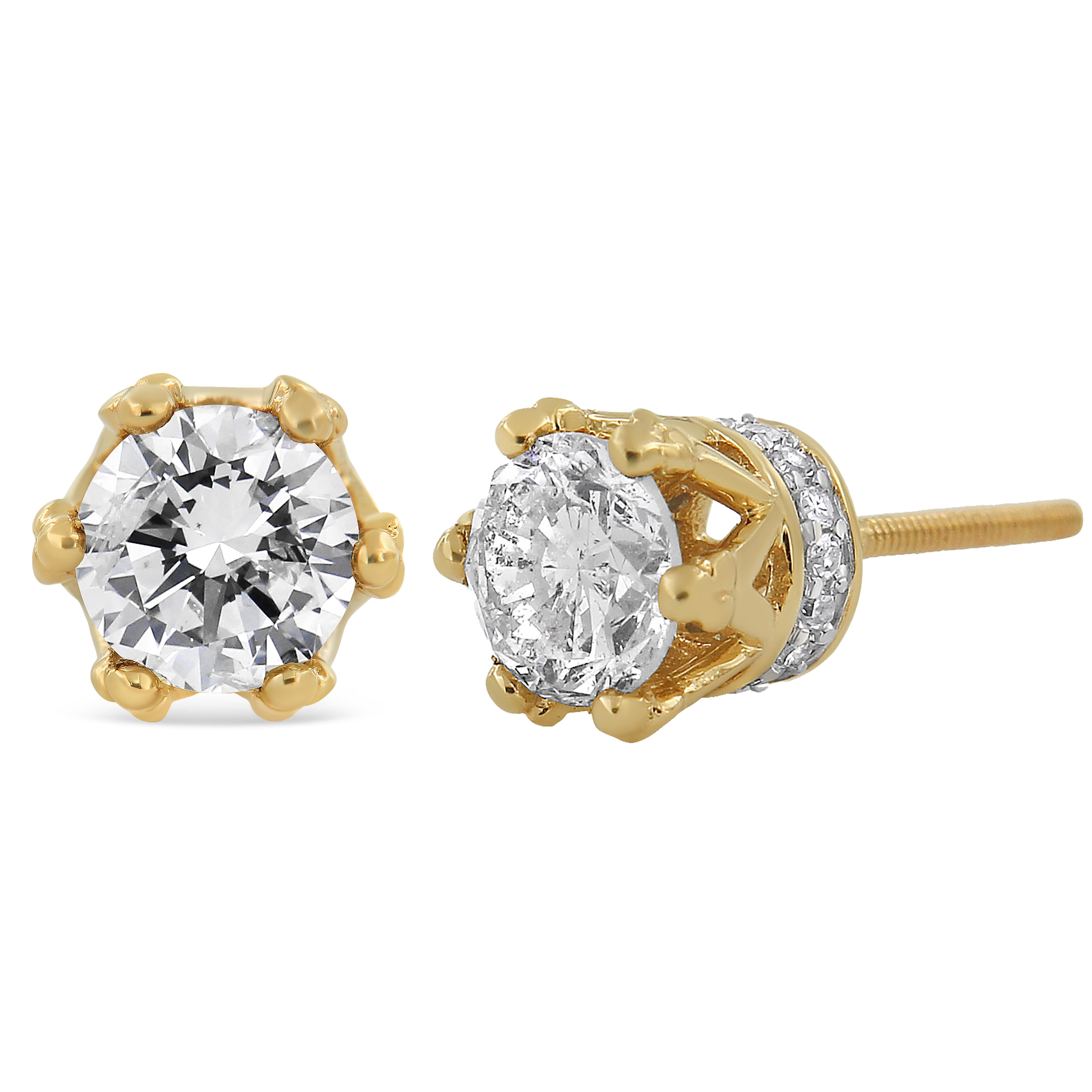 With regal hidden details, these diamond stud earrings are anything but ordinary. From the front, these 14kt yellow gold studs look like solitaires with a multi-prong setting. But the sideview brings into focus the crown design. Round diamond