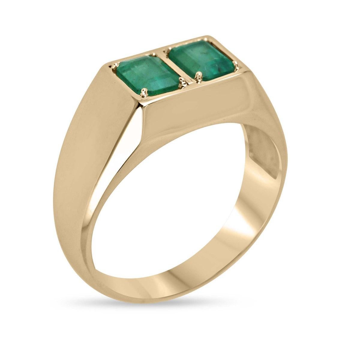 Elevate your style with our luxurious Emerald Men's Ring, boasting a stunning design featuring two vertically set emerald-cut emeralds. Their captivating lush medium green hue, paired with semi-transparent clarity, radiates sophistication and