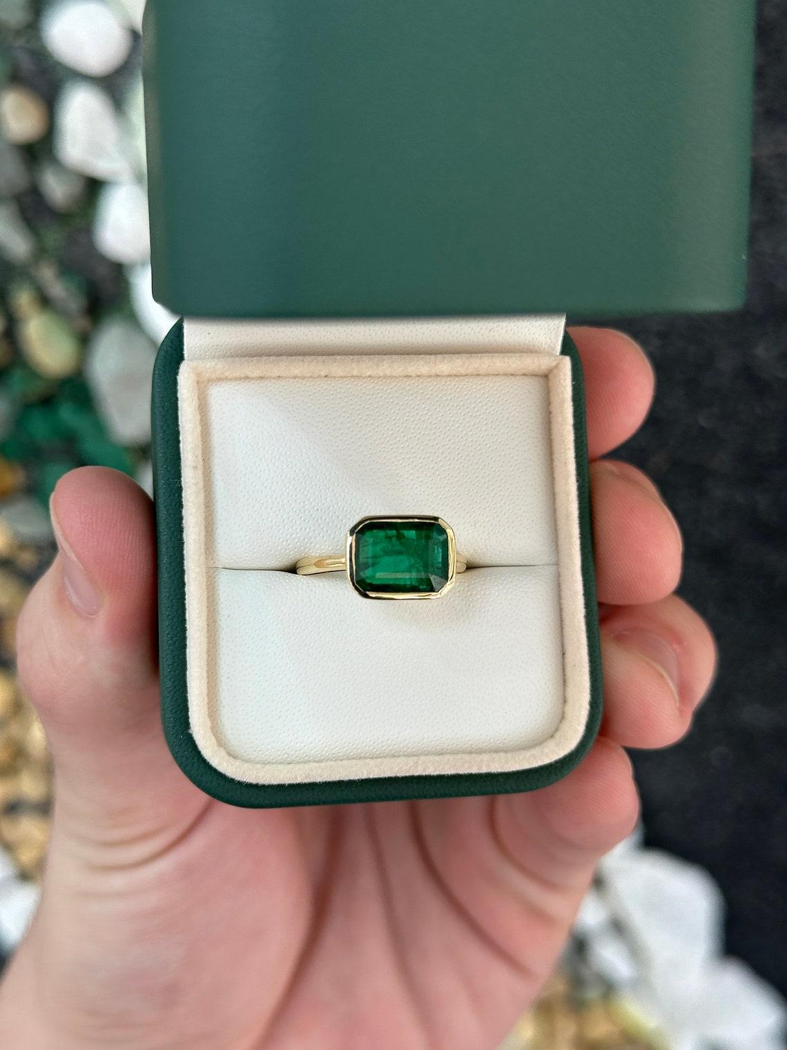 Women's 14K Gold 2.90cts Bezel Set Emerald Solitaire Ring, East-West Emerald Cut Design