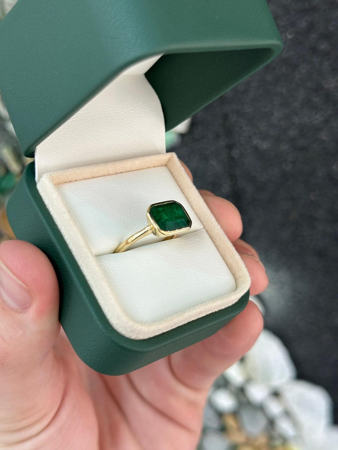 14K Gold 2.90cts Bezel Set Emerald Solitaire Ring, East-West Emerald Cut Design 1