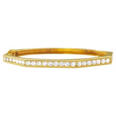 Pulsera brazalete redonda de oro de 14k con diamantes de 2 ct