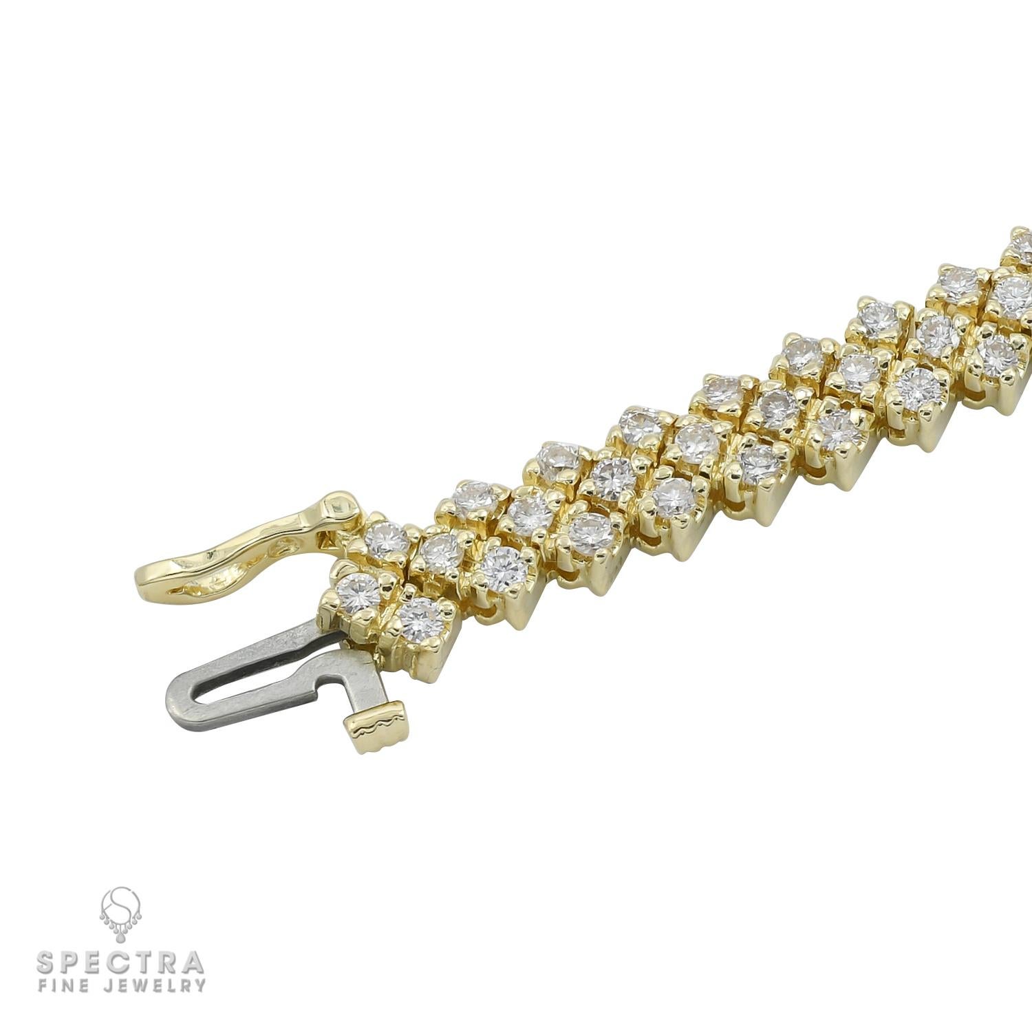 A line bracelet set with 135 round diamonds weighing a total of 4.05 carats.
Each diamond is approximately 0.03 carat.
Diamonds are natural, with G-H-I color, VS-SI clarity.
Bracelet is 7.15 inches long.
Metal is 14k yellow gold; gross weight 25.64
