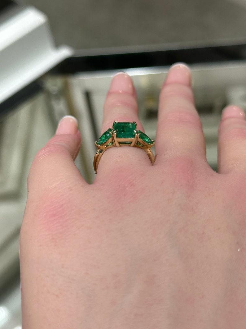 14K Gold 3.08tcw Asscher & Pear Cut Emerald Ring - Dark Green Trilogy Ring In New Condition For Sale In Jupiter, FL