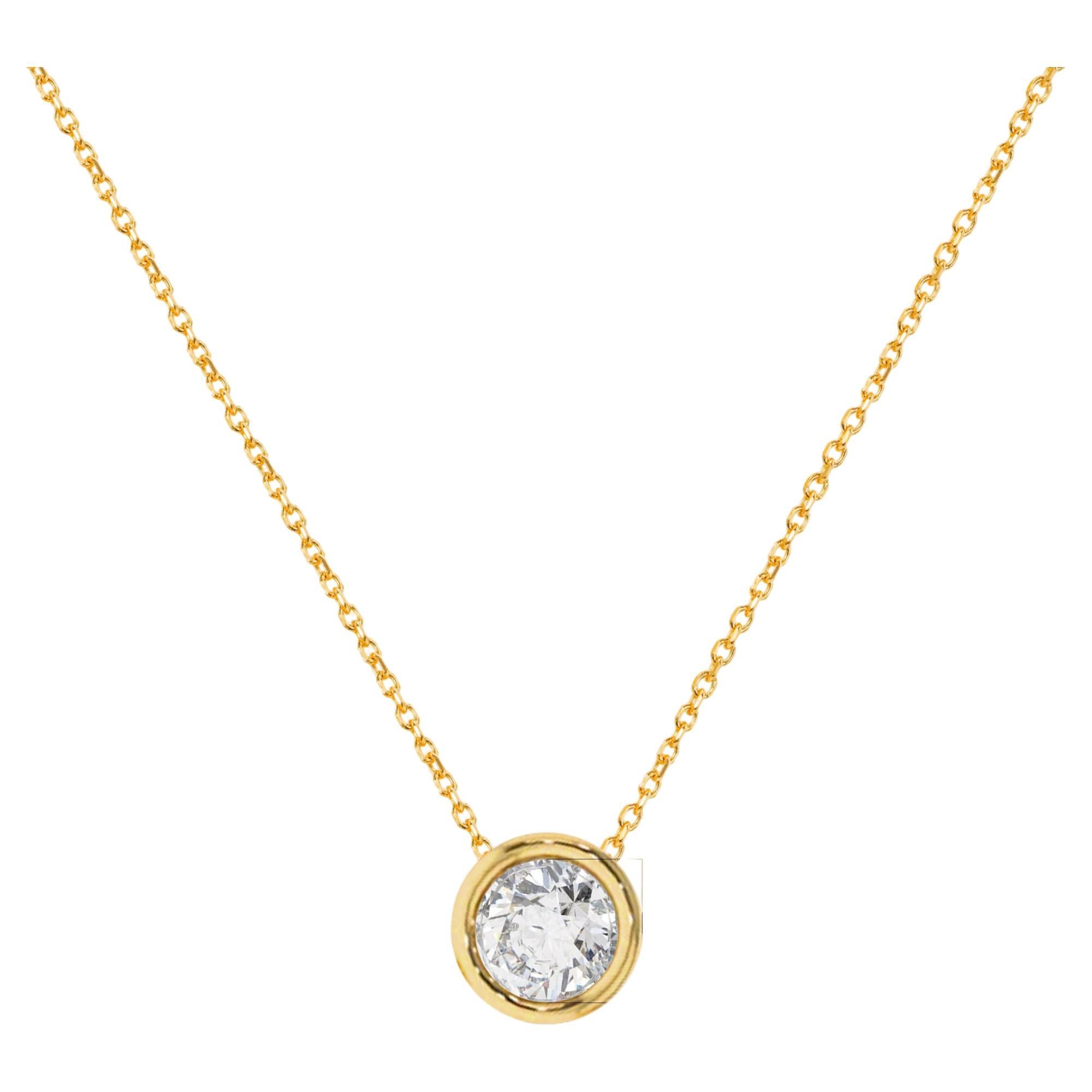 Collier solitaire en or 14 carats serti d'un diamant de 3,5 mm et d'un chaton en diamant en vente