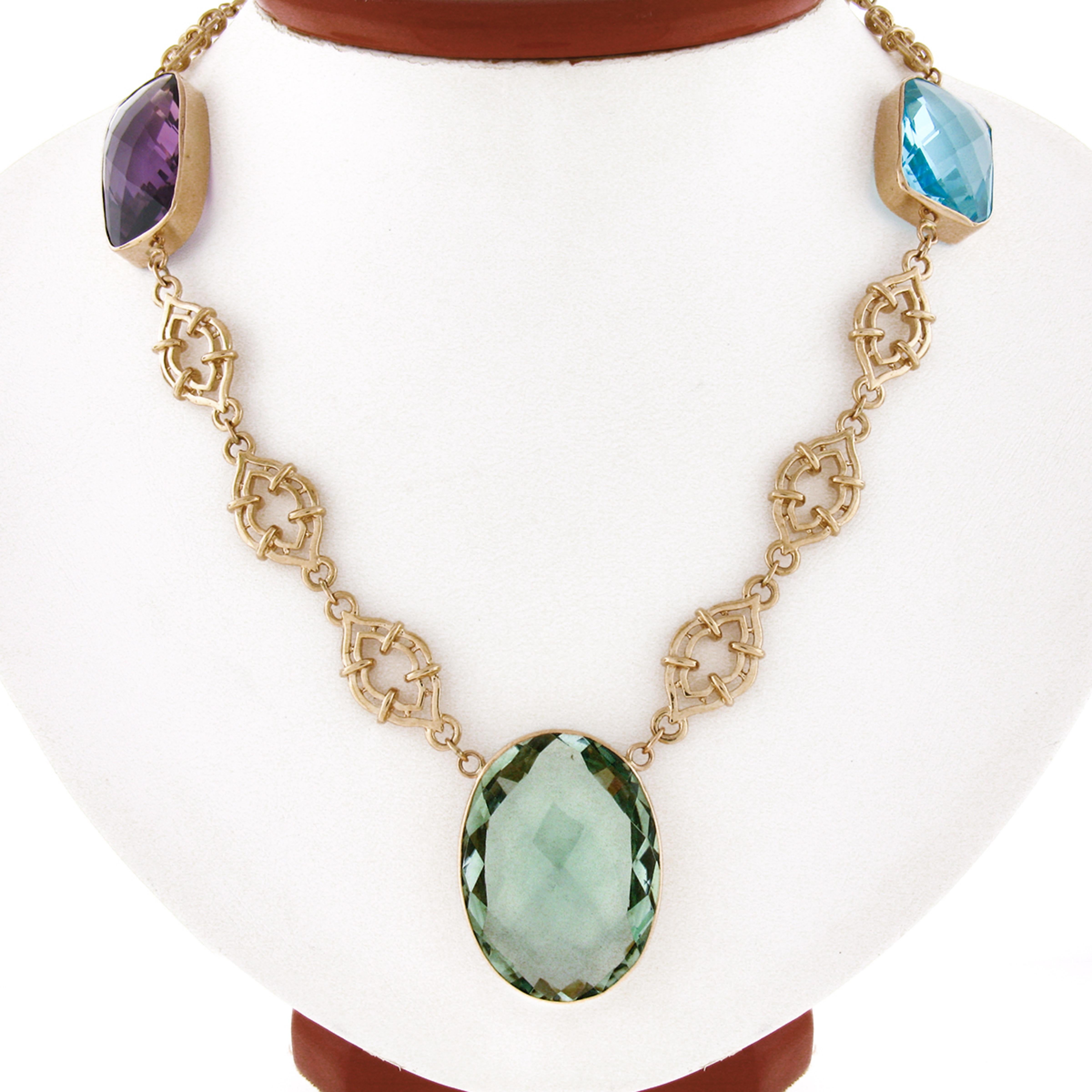 Here we have a magnificent gemstone by the yard statement necklace that is crafted in solid 14k yellow gold. This well made piece is constructed from open fancy links with a nice high-polished finish throughout with large, fine quality, natural