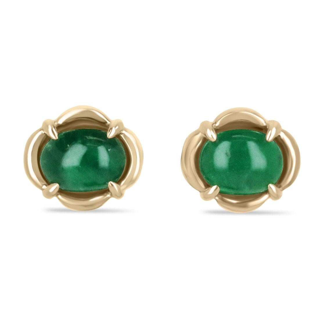 A stunning pair of unique emerald cabochon stud earrings. This beautiful pair showcases 3.85-carats of natural, emerald cabochons in the shape of an oval. Displaying a desirable rich green color and very good luster. Set in your choice of either 14K