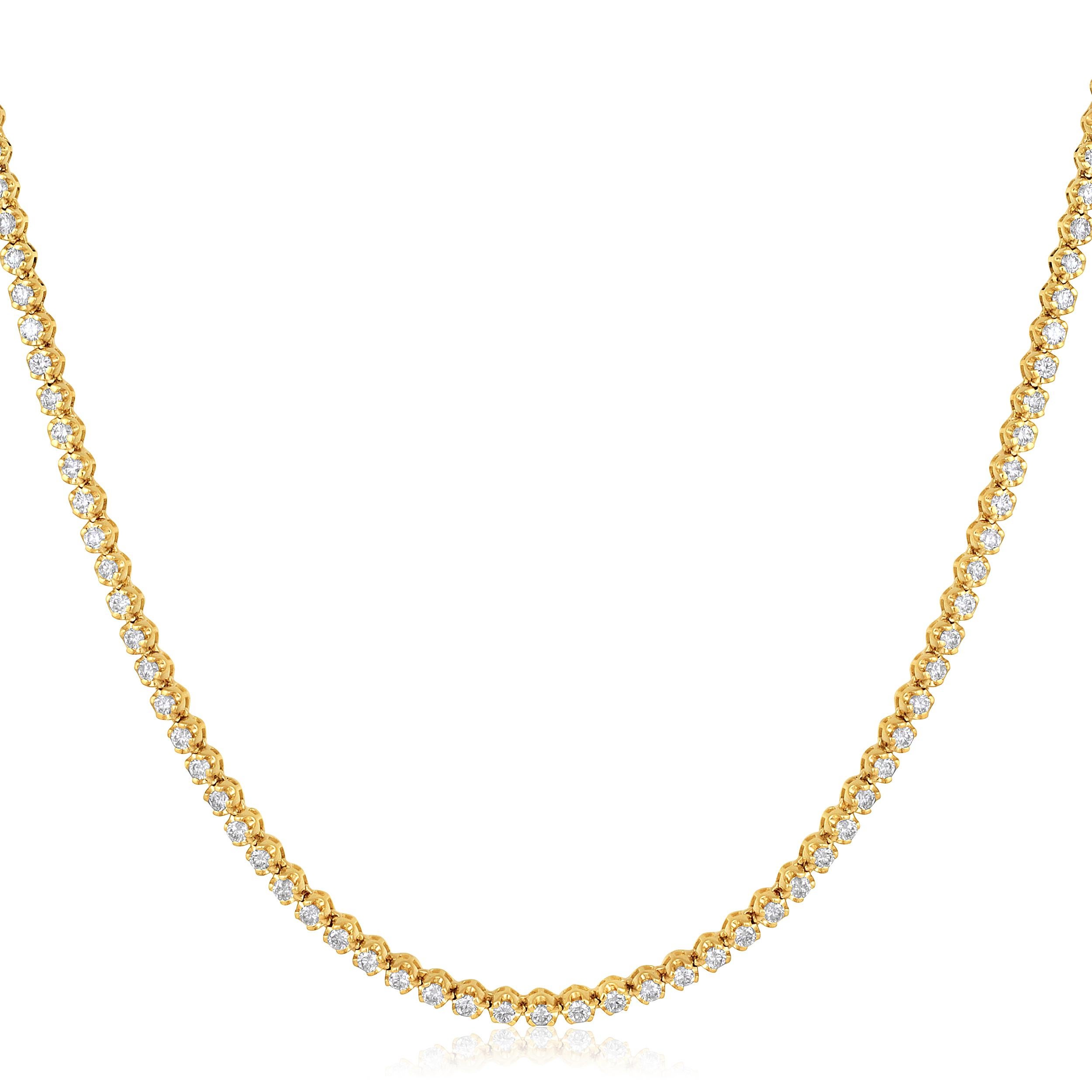 Crafted in 12.89 grams of 14K Yellow Gold, the necklace contains 122 stones of Round Natural Diamonds with a total of 3 carat in F-G color and SI clarity. The necklace length is 18 inches.

CONTEMPORARY AND TIMELESS ESSENCE: Crafted in