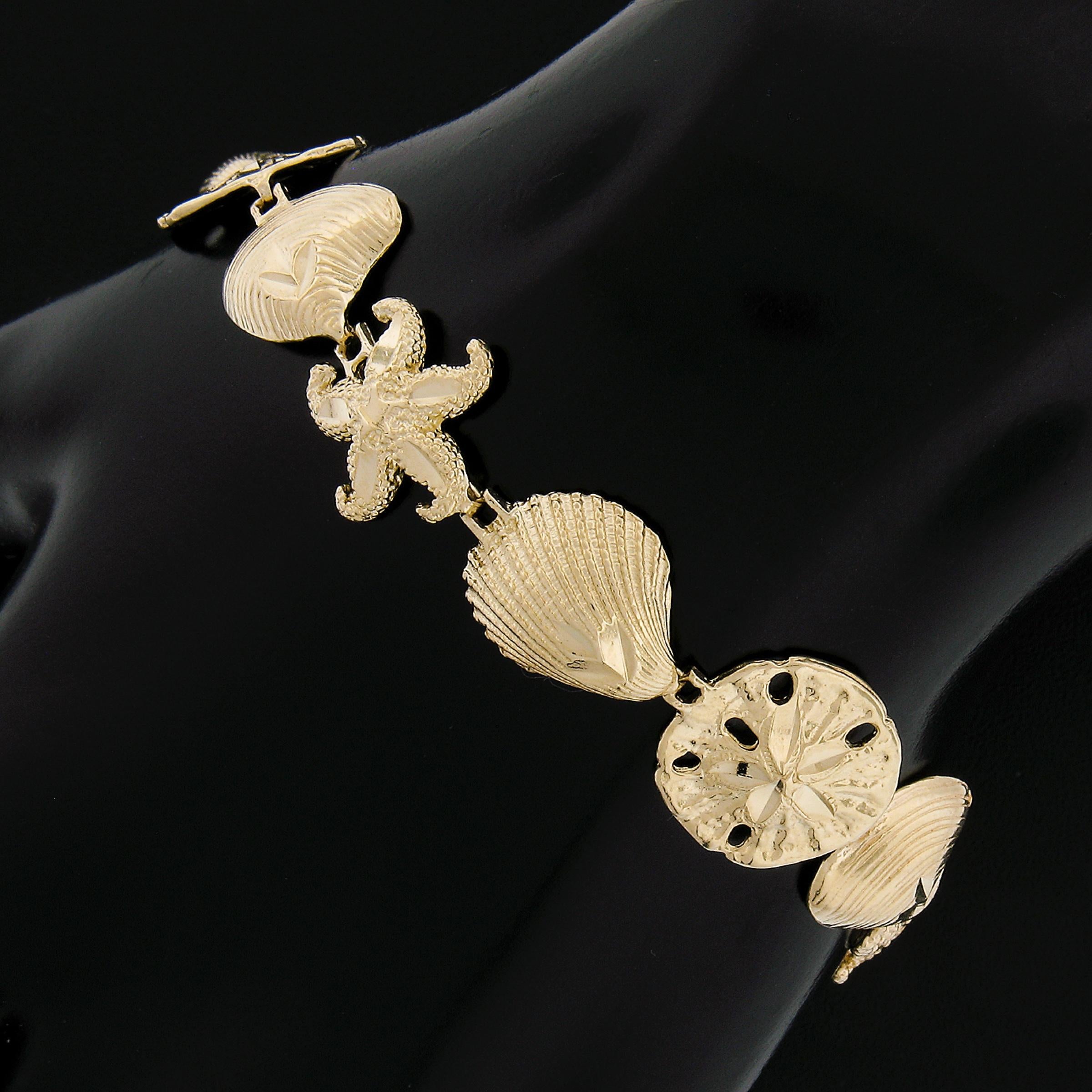 14k Gold 3D Textured Diamond Cut Star Fish Seashell & Sandstar Link Bracelet In Excellent Condition For Sale In Montclair, NJ