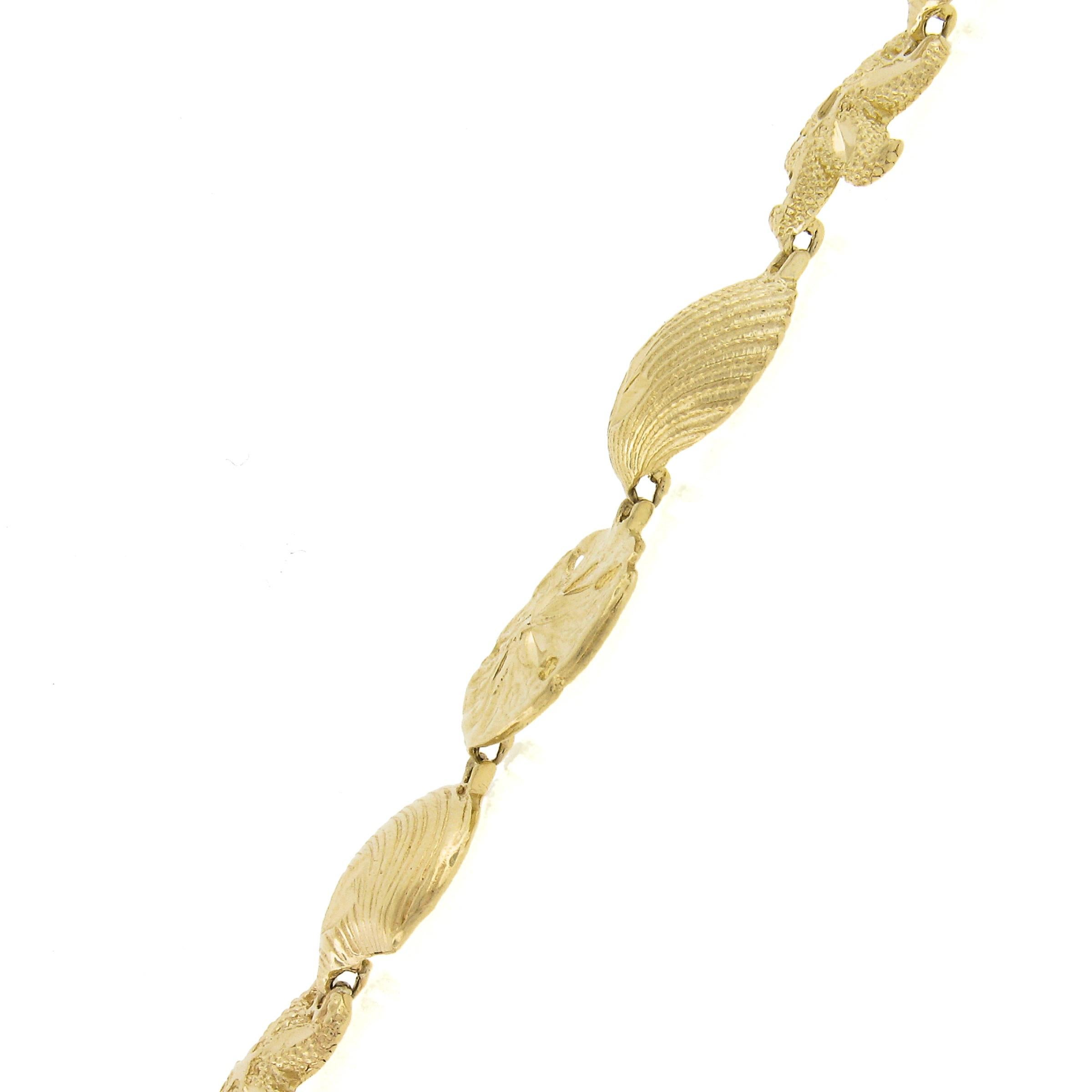 Women's 14k Gold 3D Textured Diamond Cut Star Fish Seashell & Sandstar Link Bracelet For Sale