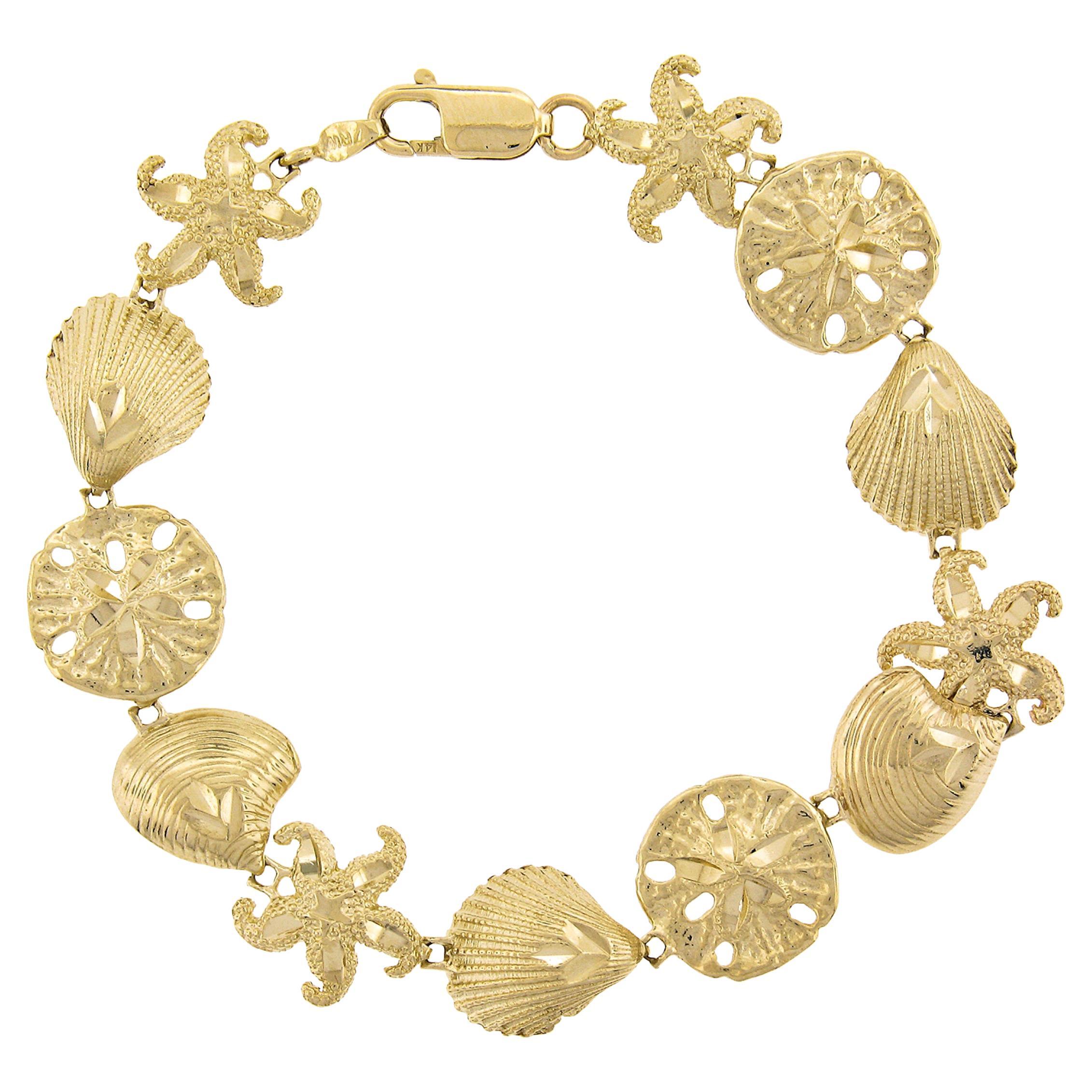 14k Gold 3D Textured Diamond Cut Star Fish Seashell & Sandstar Link Bracelet For Sale