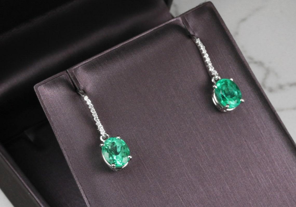 Modern 14K Gold 4.25tcw Vivid Green Colombian Emerald Oval & Diamond Pave Dangle For Sale