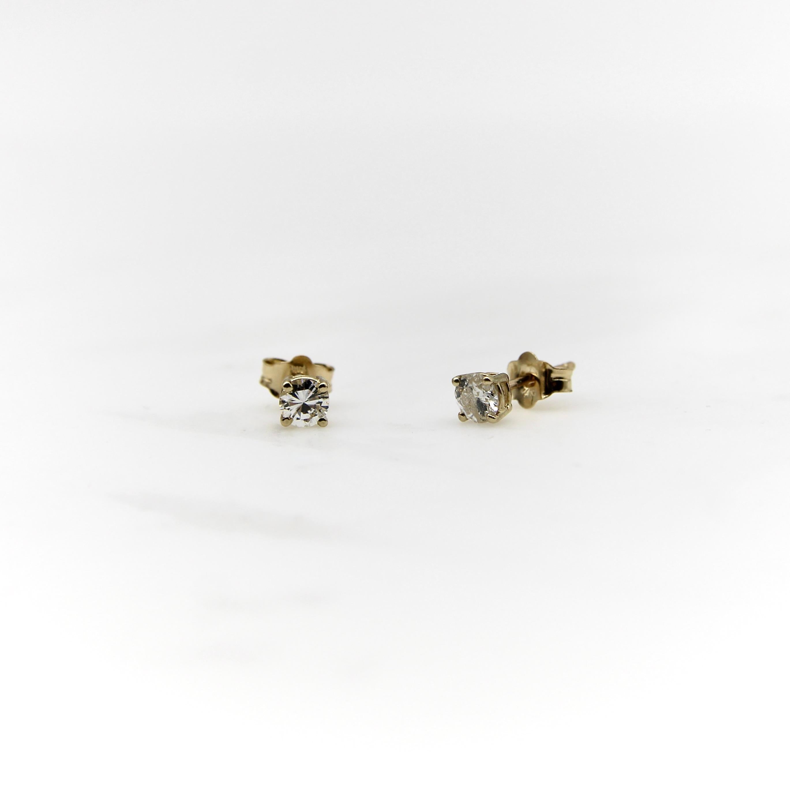 A classic, everyday pair of earrings, these 14k gold diamond studs are a staple in any jewelry collection. At 3.75 mm, these earrings are the perfect size to wear as stand alone studs or in a row of piercings. Set in a 14k gold prong setting, the