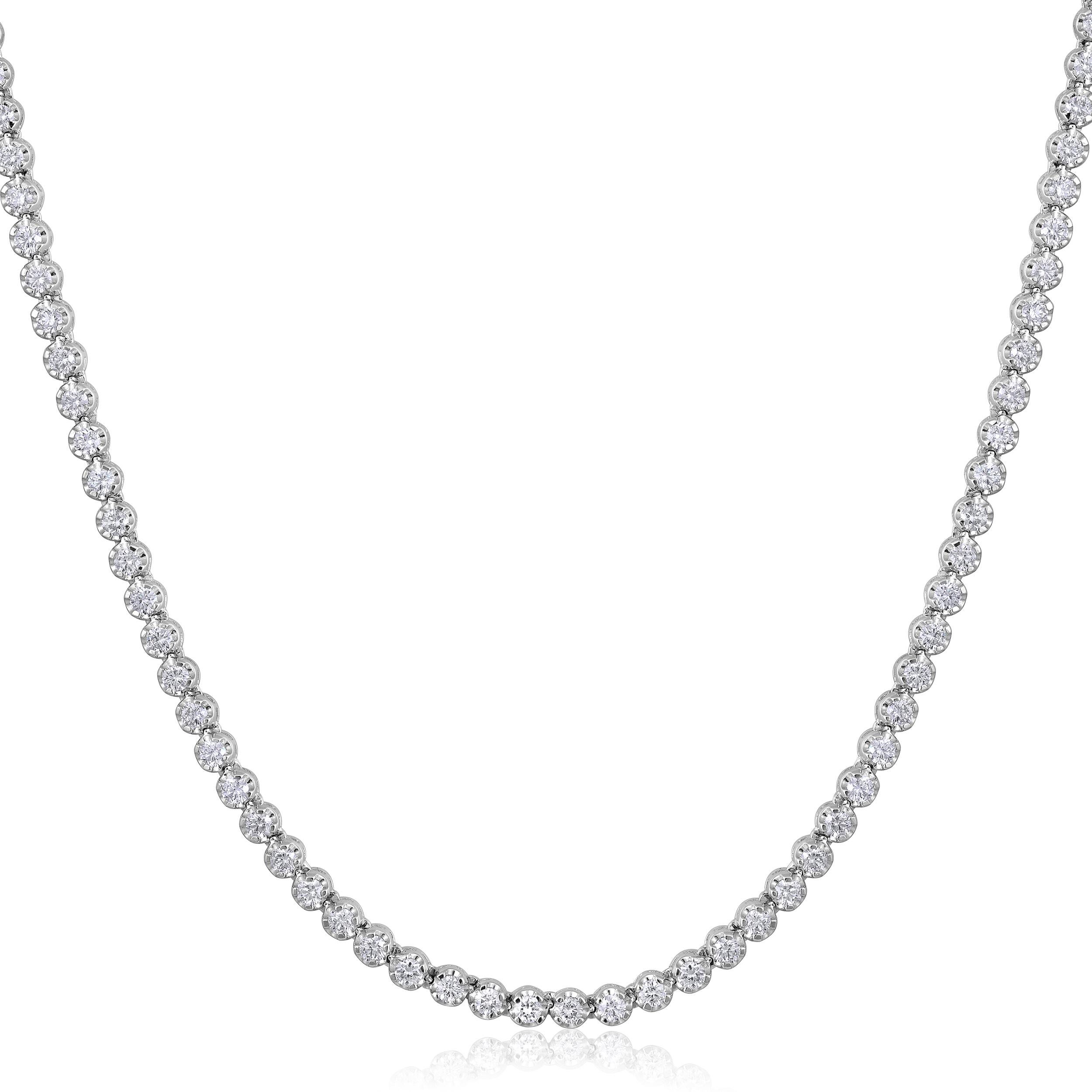 Crafted in 15.07 grams of 14K White Gold, the necklace contains 110 stones of Round Natural Diamonds with a total of 4 carat in G-H color and SI clarity. The necklace length is 18 inches.

CONTEMPORARY AND TIMELESS ESSENCE: Crafted in