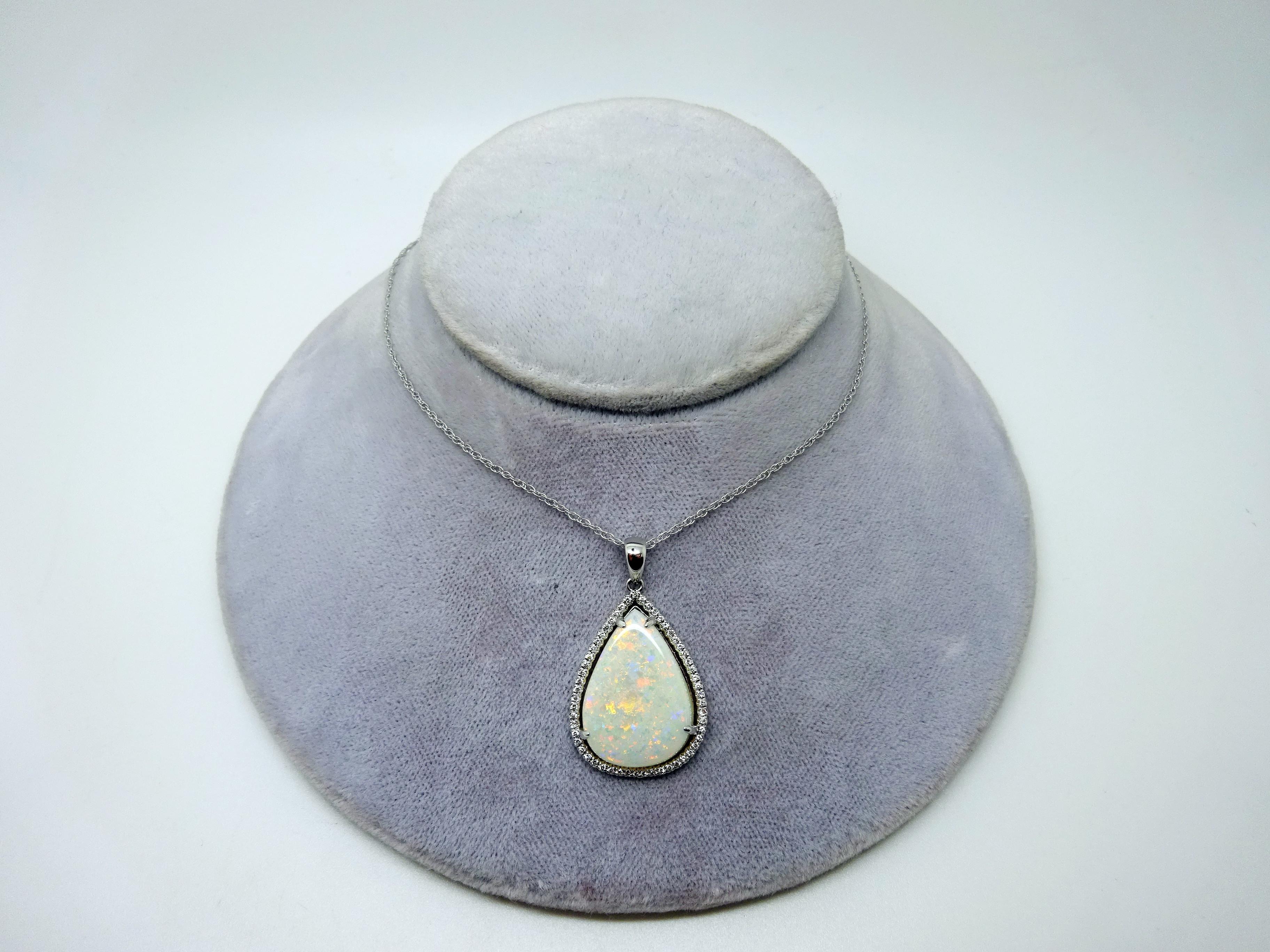 Contemporary 14k Gold 5.67ct Pear Genuine Natural Opal Pendant with .16ct Diamonds '#3427' For Sale