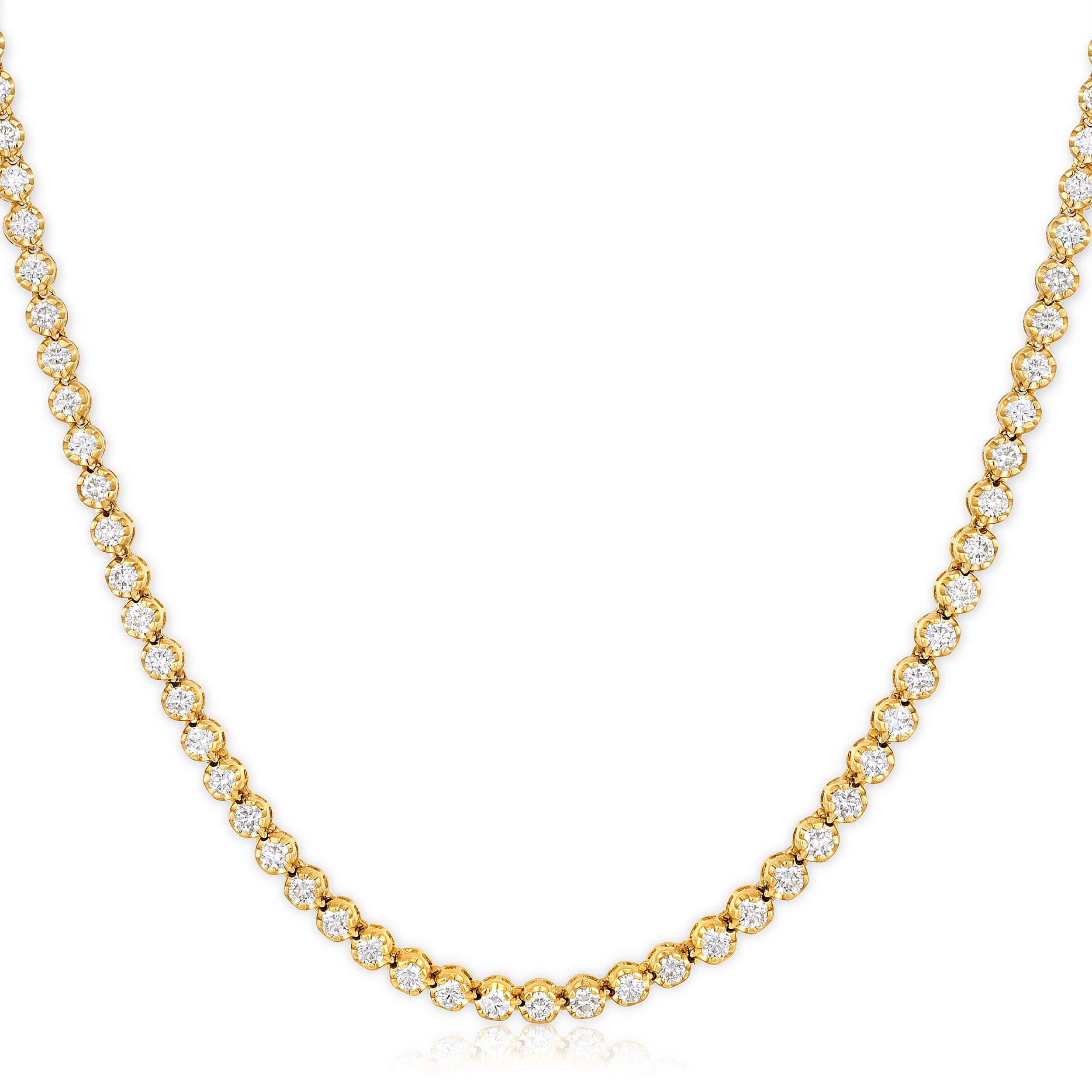 Crafted in 18.61 grams of 14K Yellow Gold, the necklace contains 123 stones of Round Natural Diamonds with a total of 4.98 carat in F-G color and SI clarity. The necklace length is 18 inches.

CONTEMPORARY AND TIMELESS ESSENCE: Crafted in