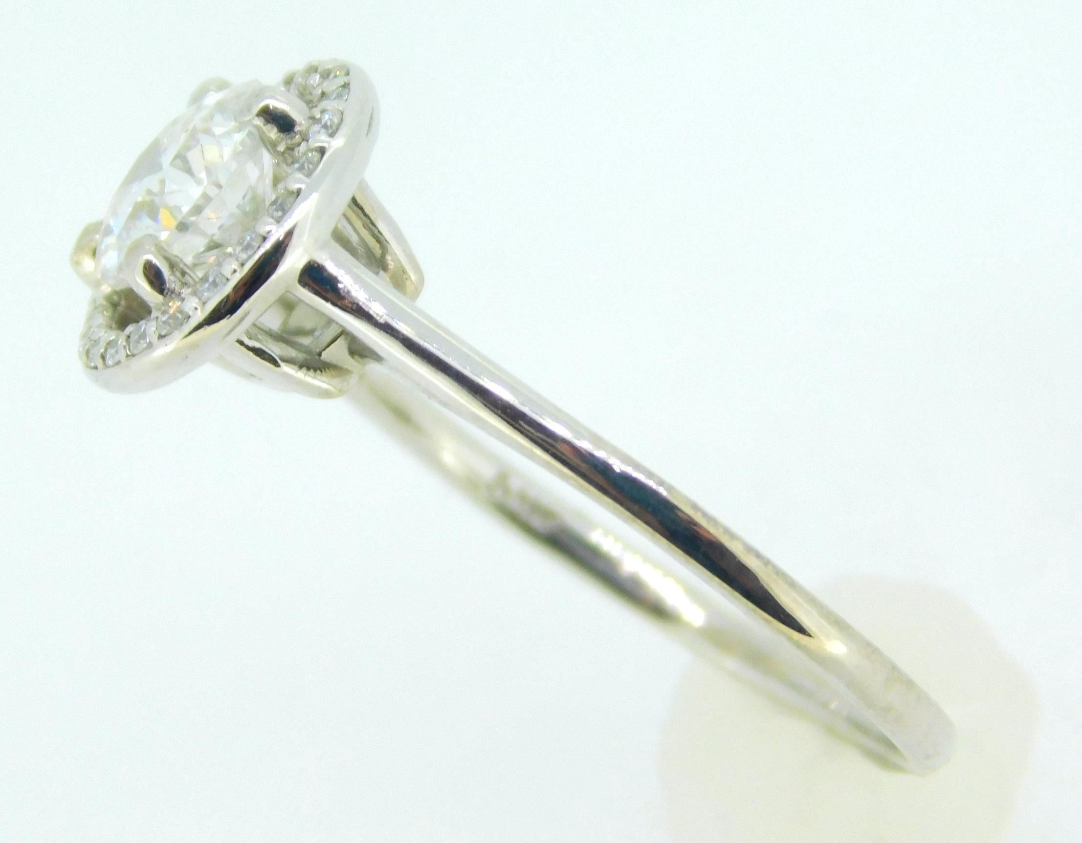 14k Gold .85ct Genuine Natural Diamond Ring with Diamond Halo (#J4123)

14k white gold ring featuring stunning round diamonds. The center diamond weighs .85 cts and measures approximately 6.0mm. There is a halo of small round diamonds with total