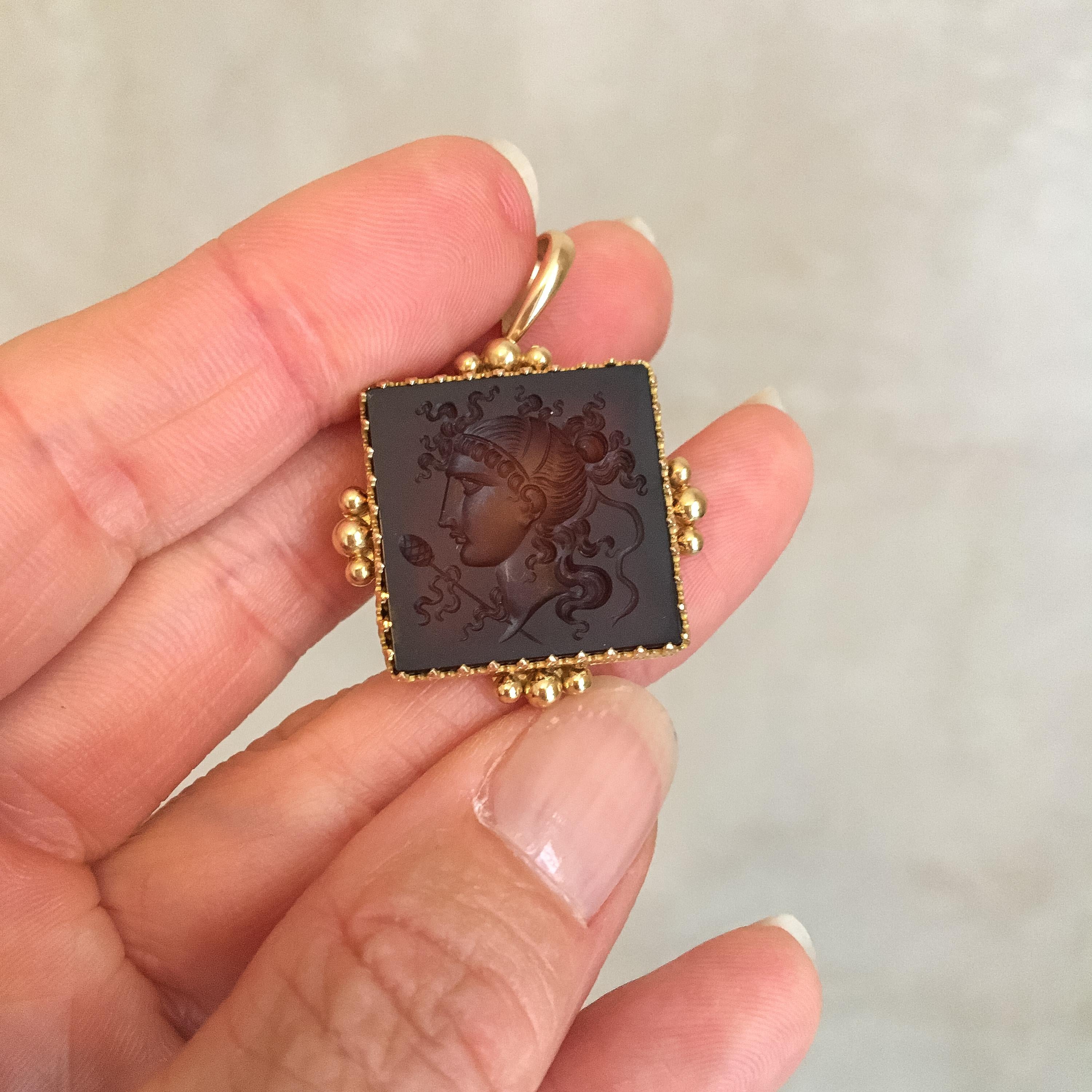 antique black intaglio pendant and 14k gold pendant hanger