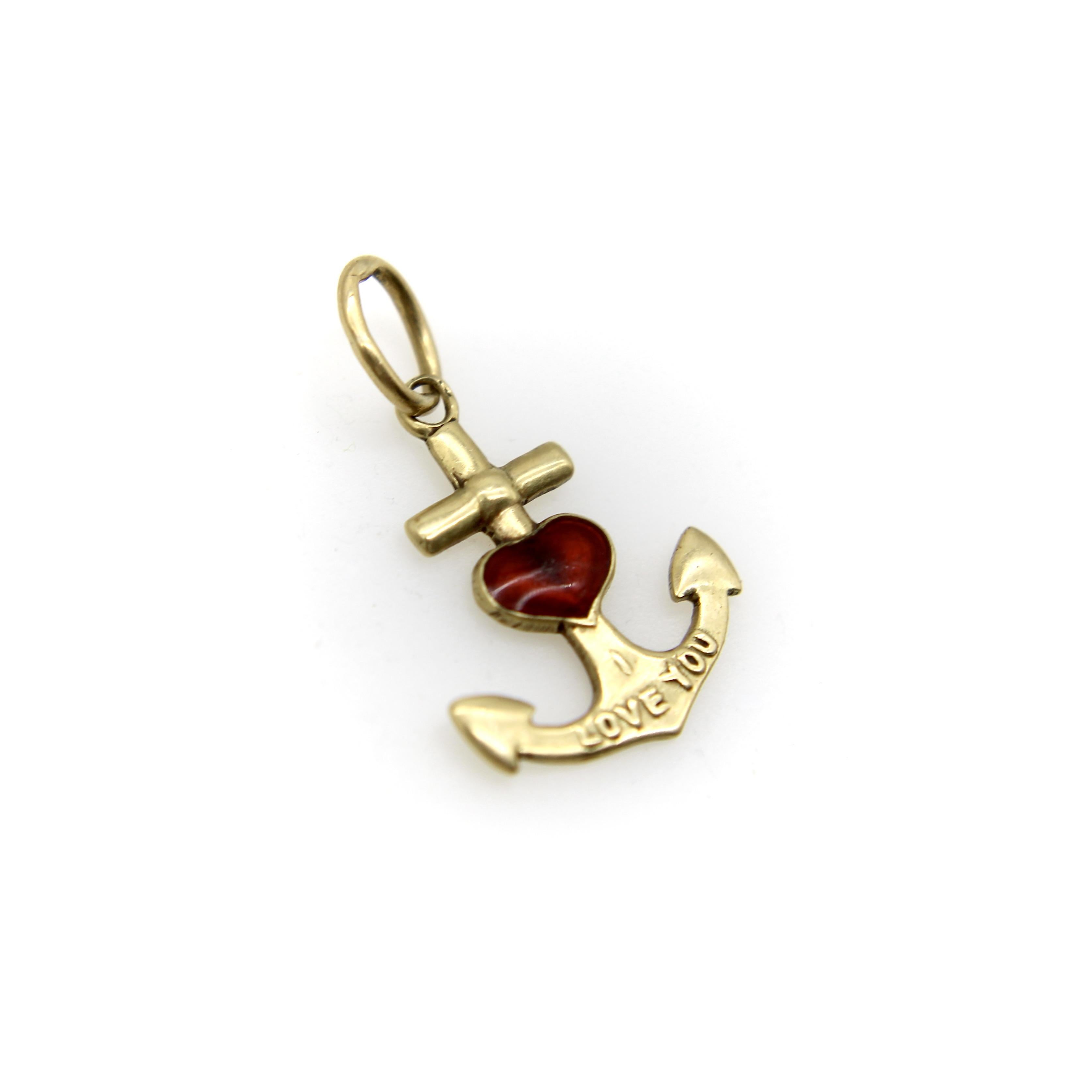 A very sweet little 14k gold anchor, this tiny charm is an adorable version of the classic symbol. A red enamel heart dots the center of the anchor, and the words “I love you” are engraved across the bottom bar. We love the proportions of the enamel